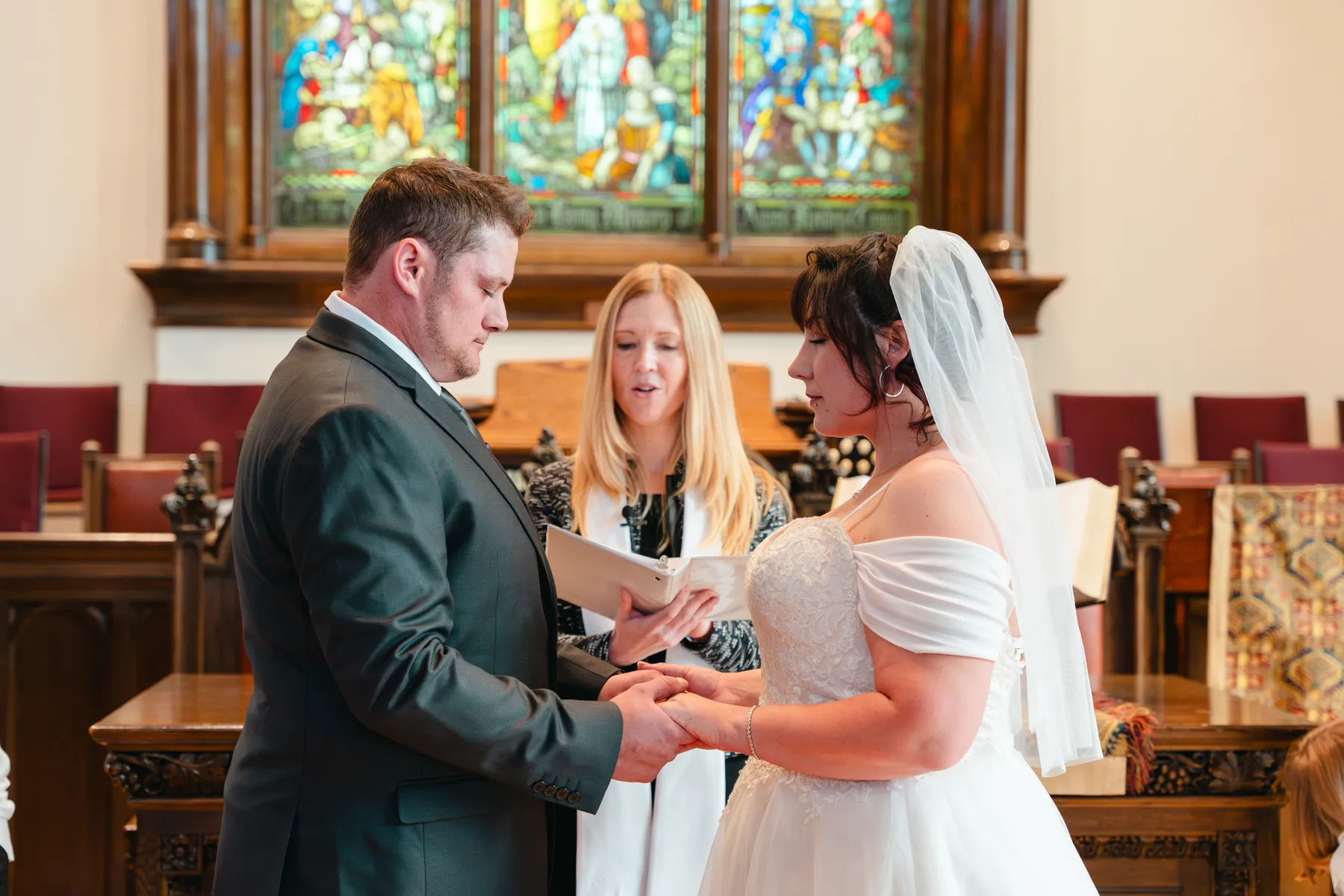 The couple and wedding party during the church ceremony at Kody and Jaz’s wedding.