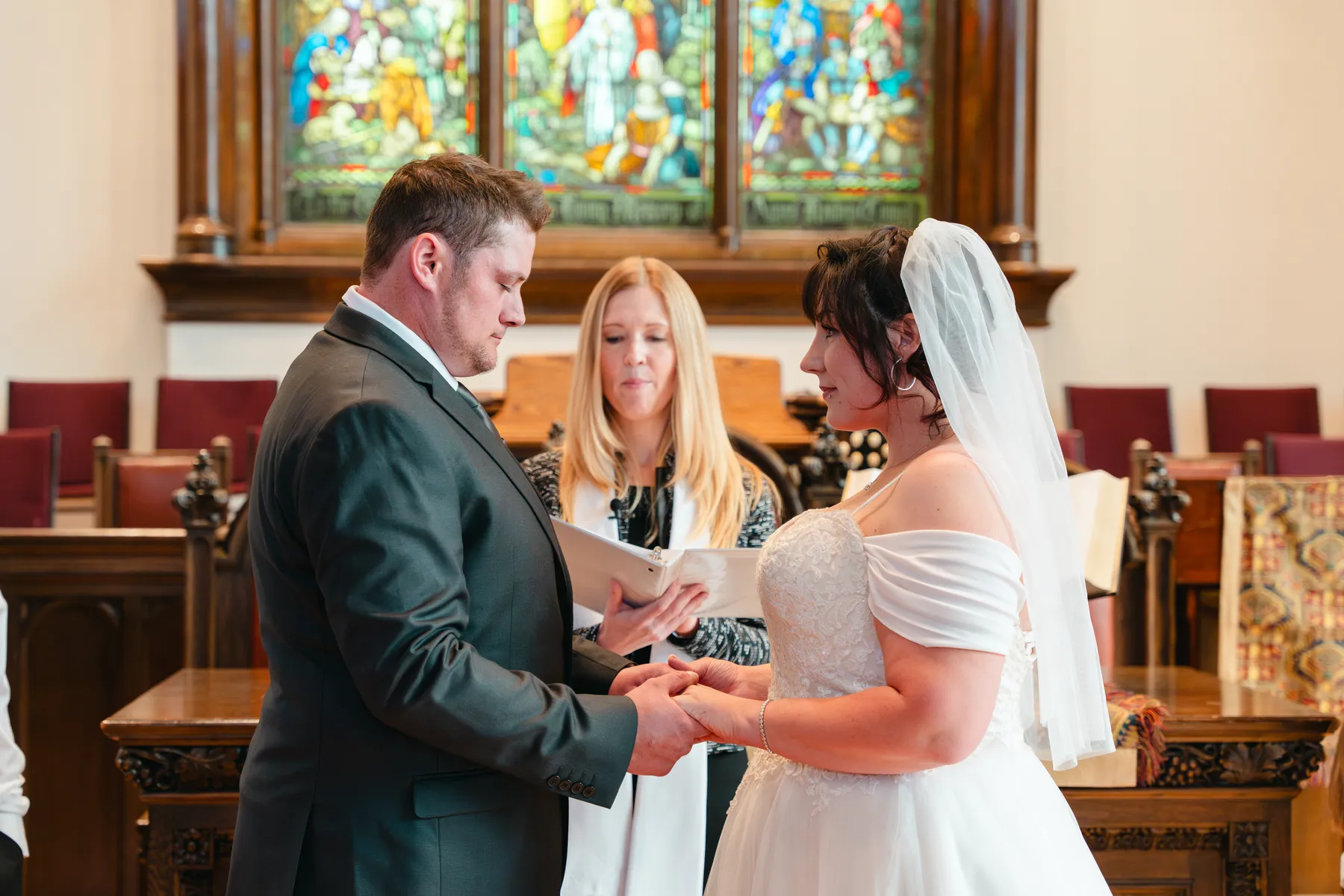 The couple and wedding party during the church ceremony at Kody and Jaz’s wedding.