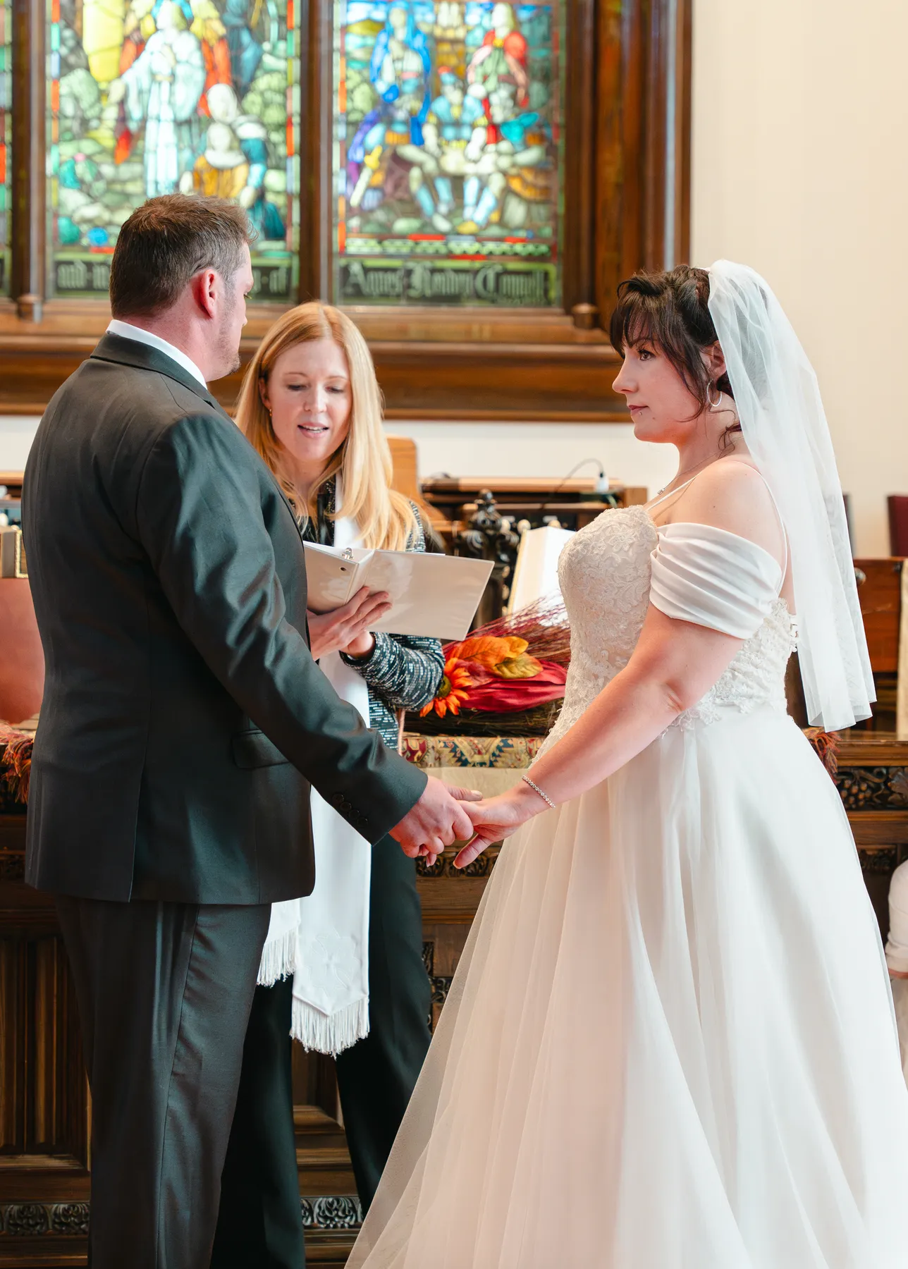 The couple and wedding party during the church ceremony at Kody and Jaz’s wedding.