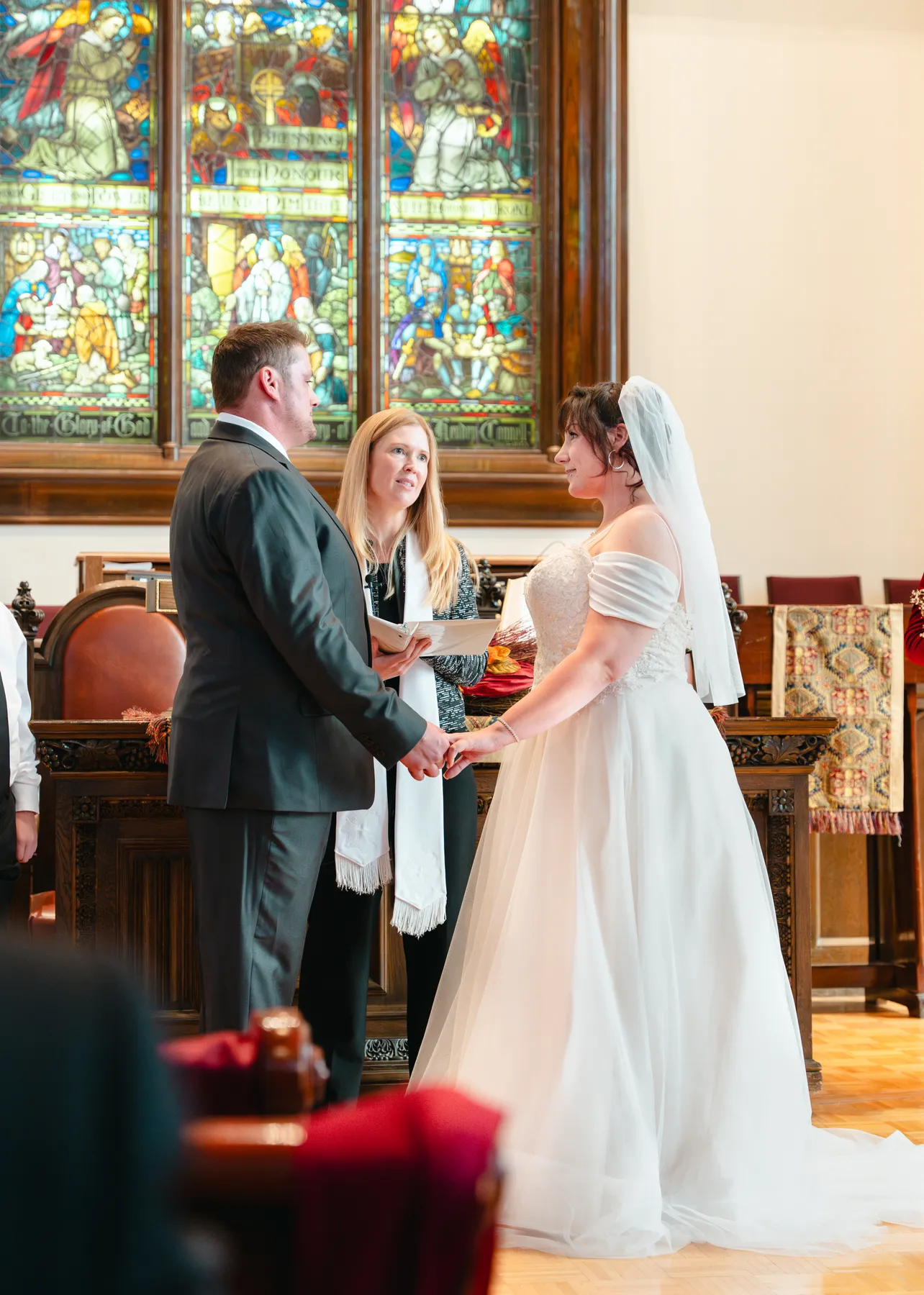 The couple and wedding party during the church ceremony at Kody and Jaz’s wedding.
