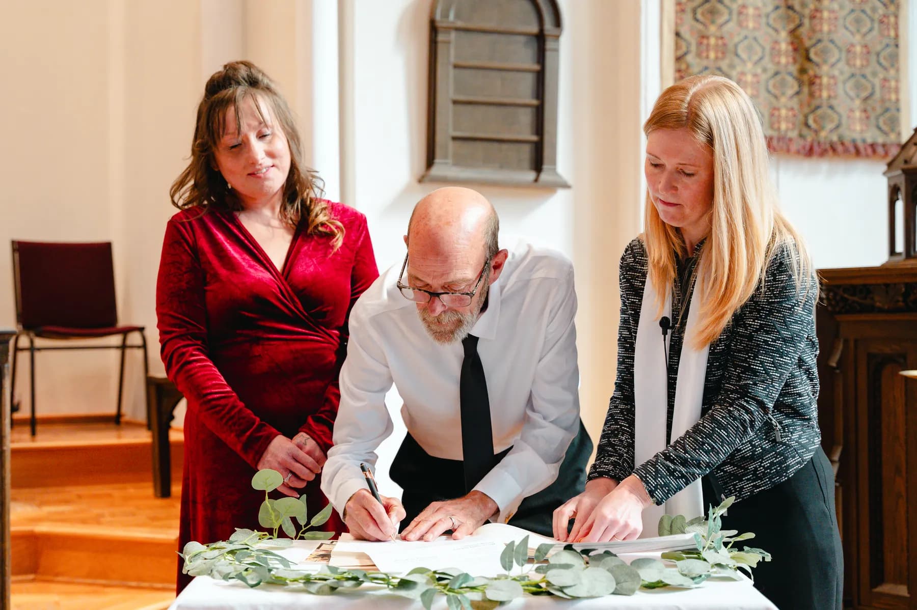 Wedding documents being signed at Kody and Jaz’s wedding.