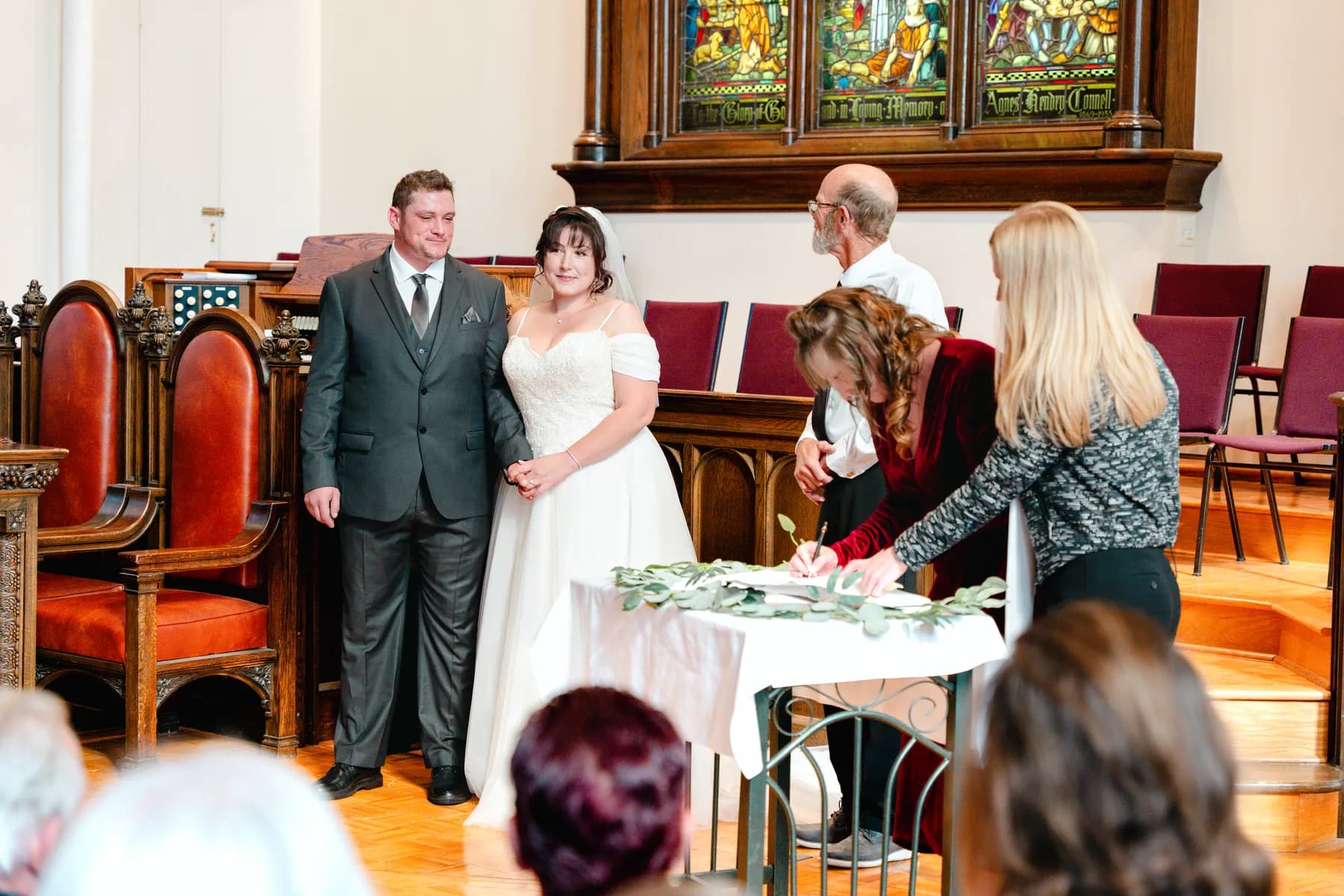 Wedding documents being signed at Kody and Jaz’s wedding.