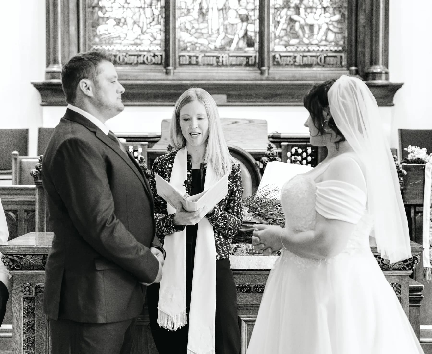 The couple embracing during the ceremony at Kody and Jaz’s wedding.
