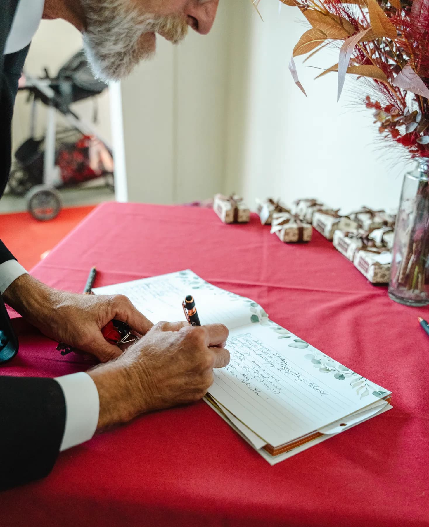 Details and guests in the reception room at Kody and Jaz’s wedding.