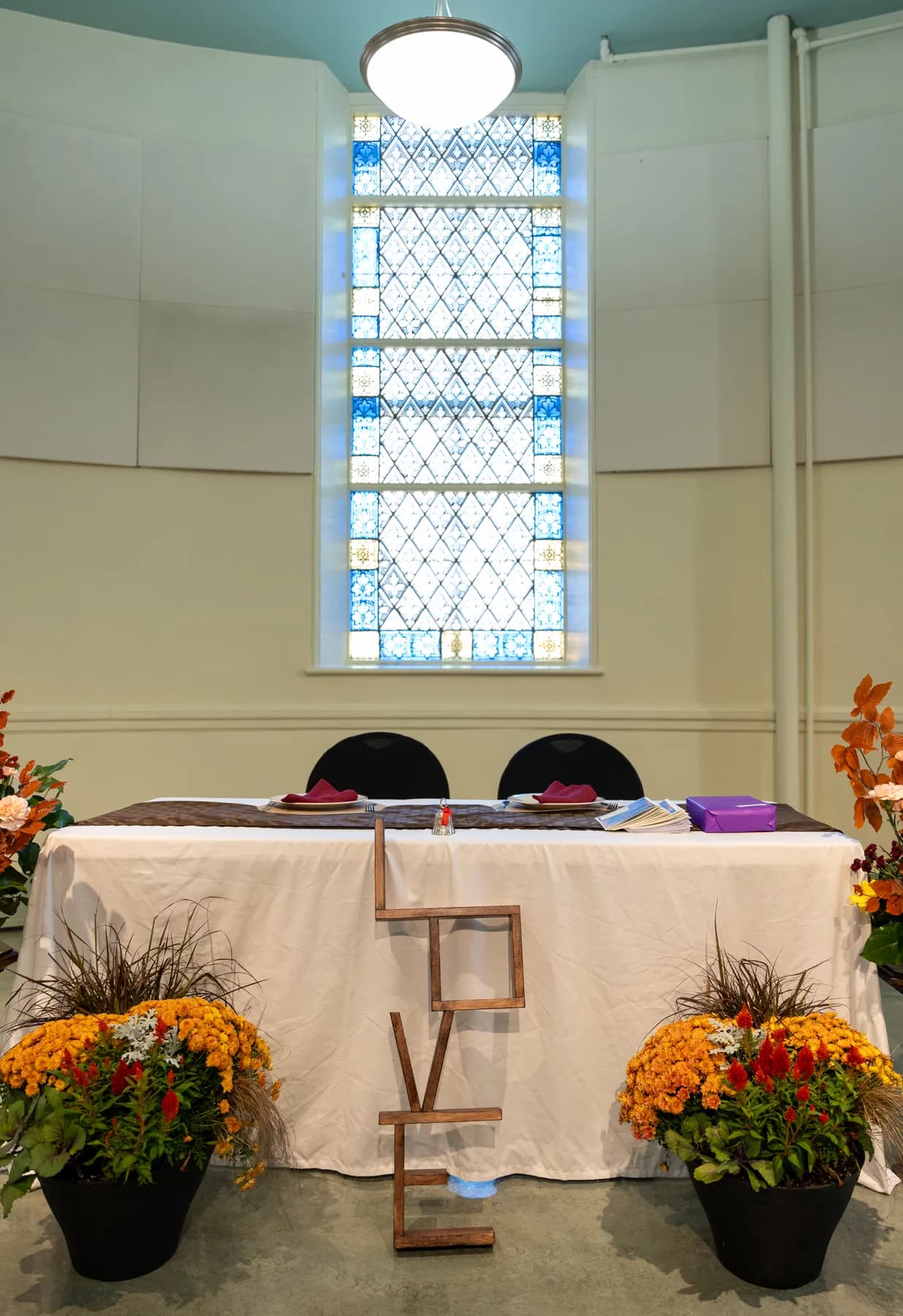 Guests seated in the reception room at Kody and Jaz’s wedding.
