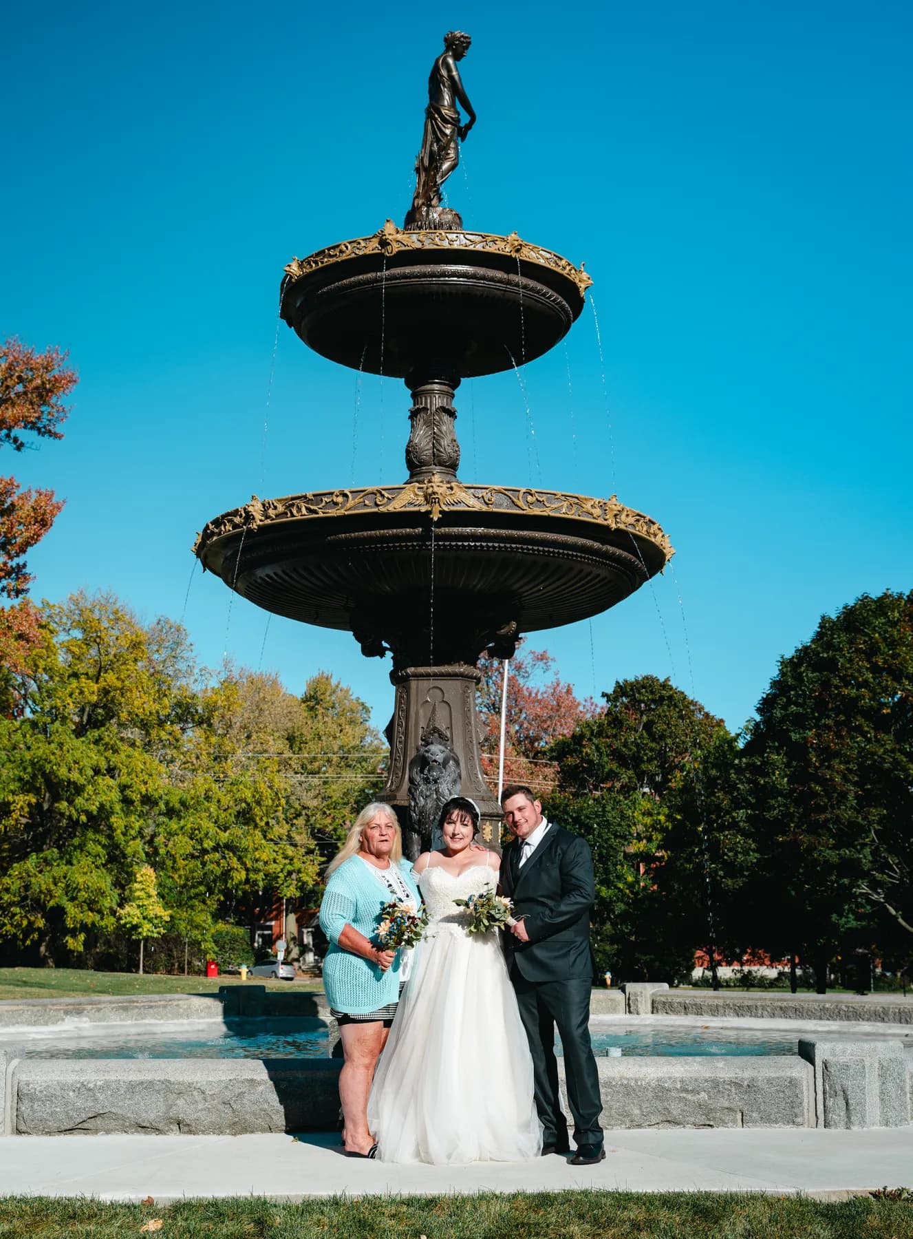Wedding portraits beside the fountain at Kody and Jaz’s wedding.