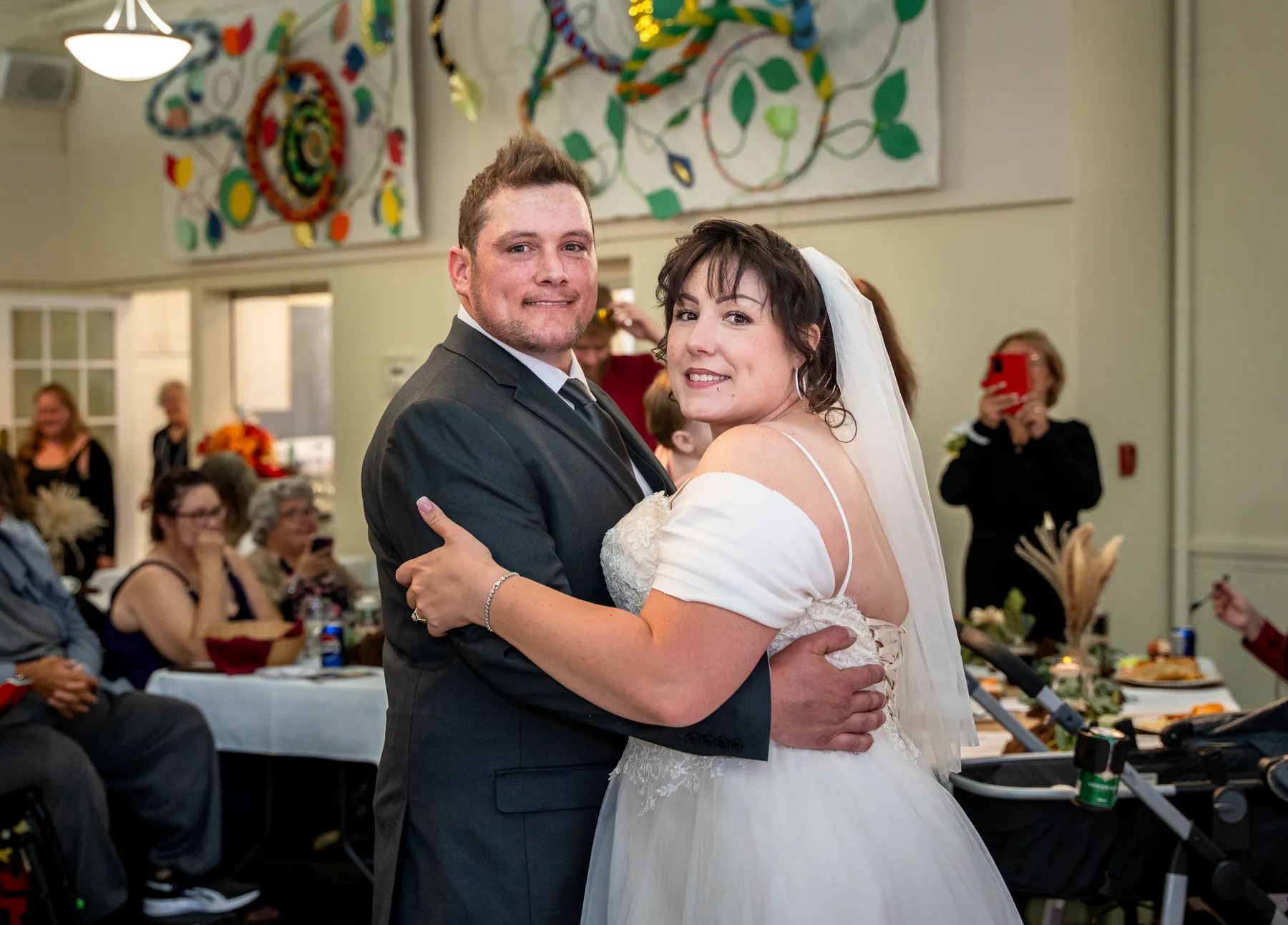 The couple and guests dancing at the reception at Kody and Jaz’s wedding.
