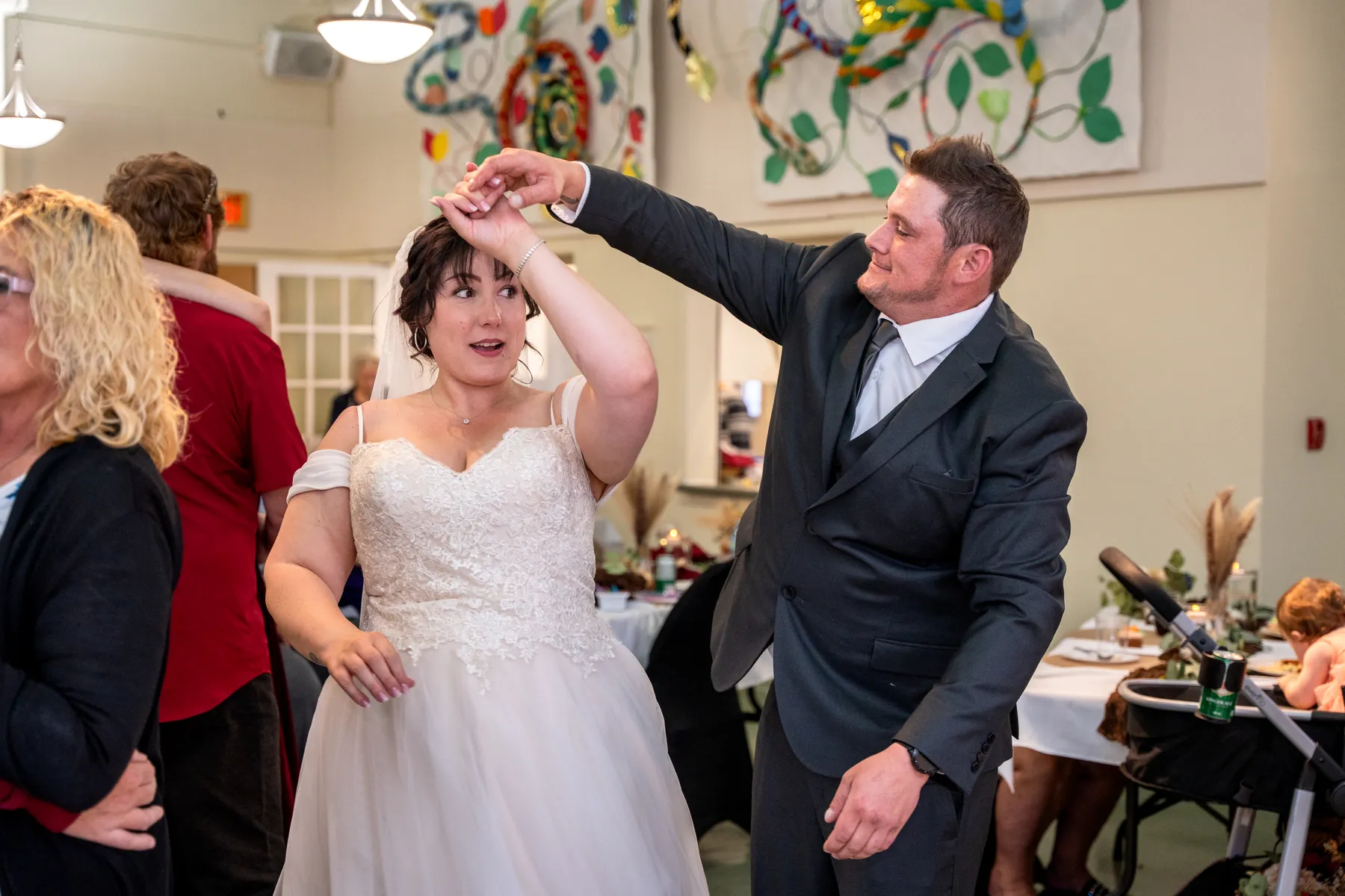 The couple and guests dancing at the reception at Kody and Jaz’s wedding.