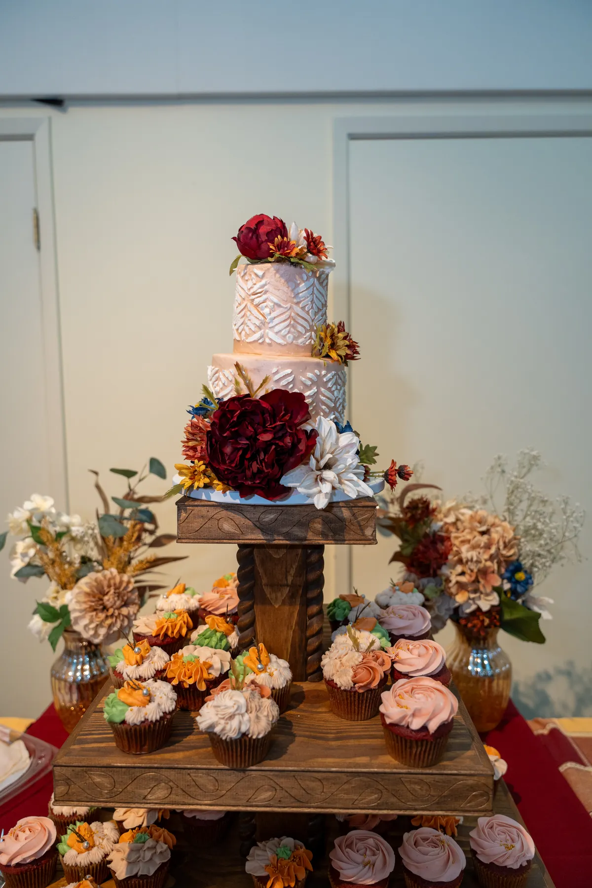 The wedding cake and dessert display at Kody and Jaz’s wedding.