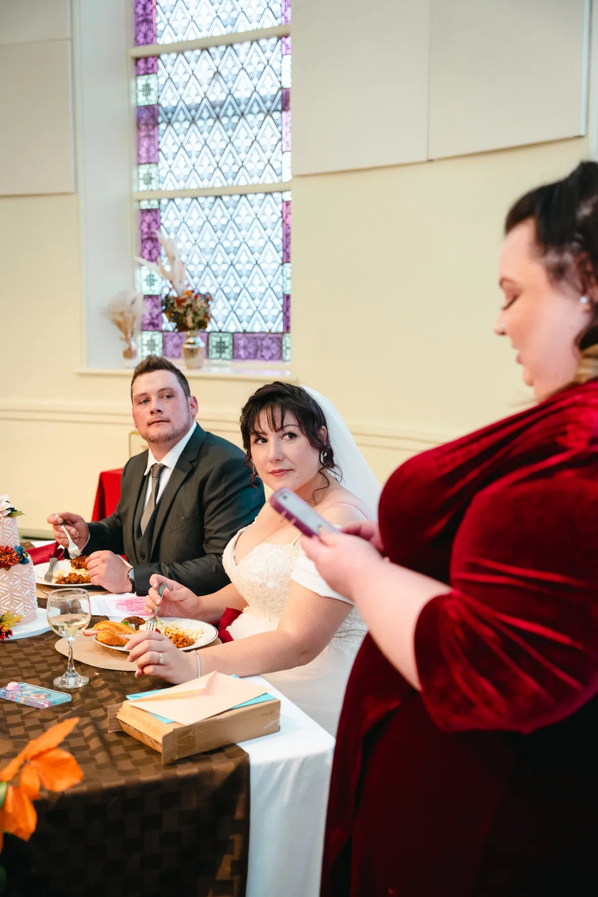 A guest speaking near the couple at Kody and Jaz’s wedding.