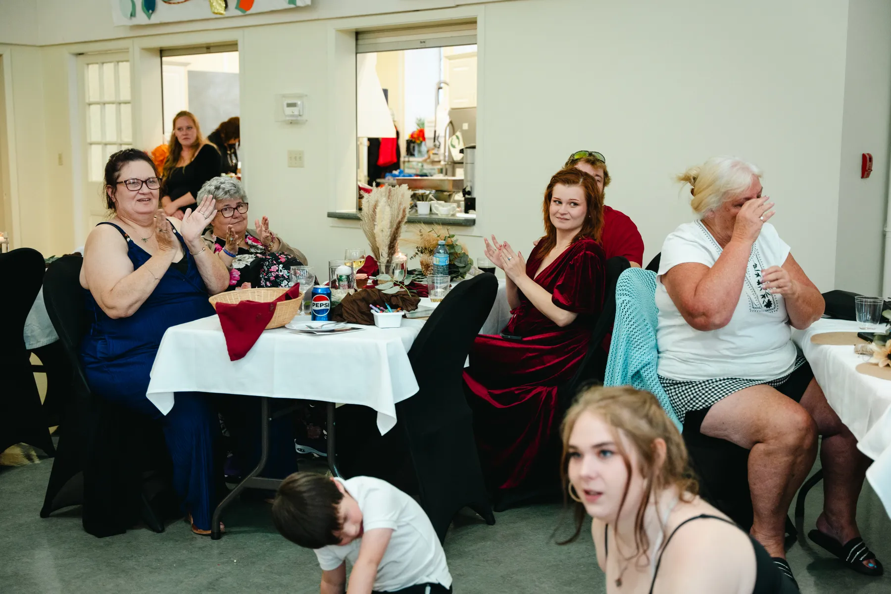Guests during the reception speeches at Kody and Jaz’s wedding.