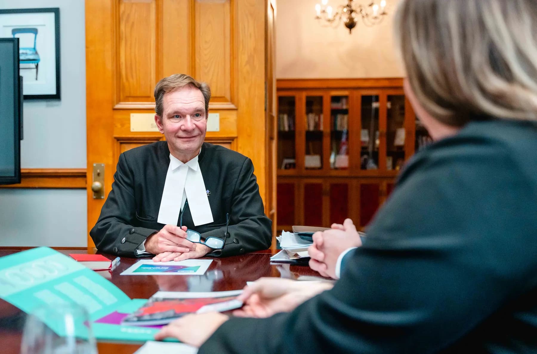 Participants meeting and talking in an office at the IBAO event at Queen’s Park.