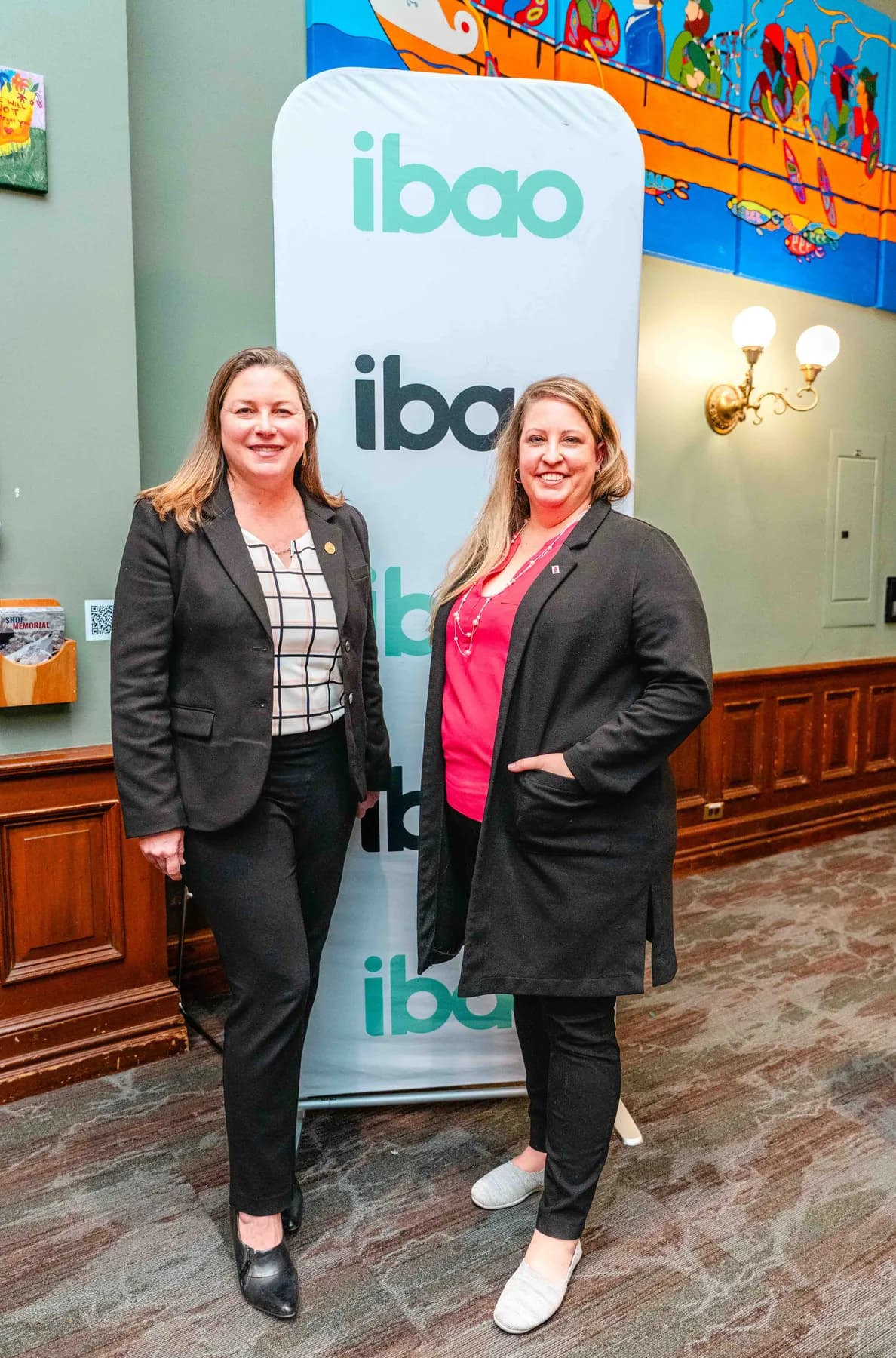 Two women posing together at the IBAO event at Queen’s Park.