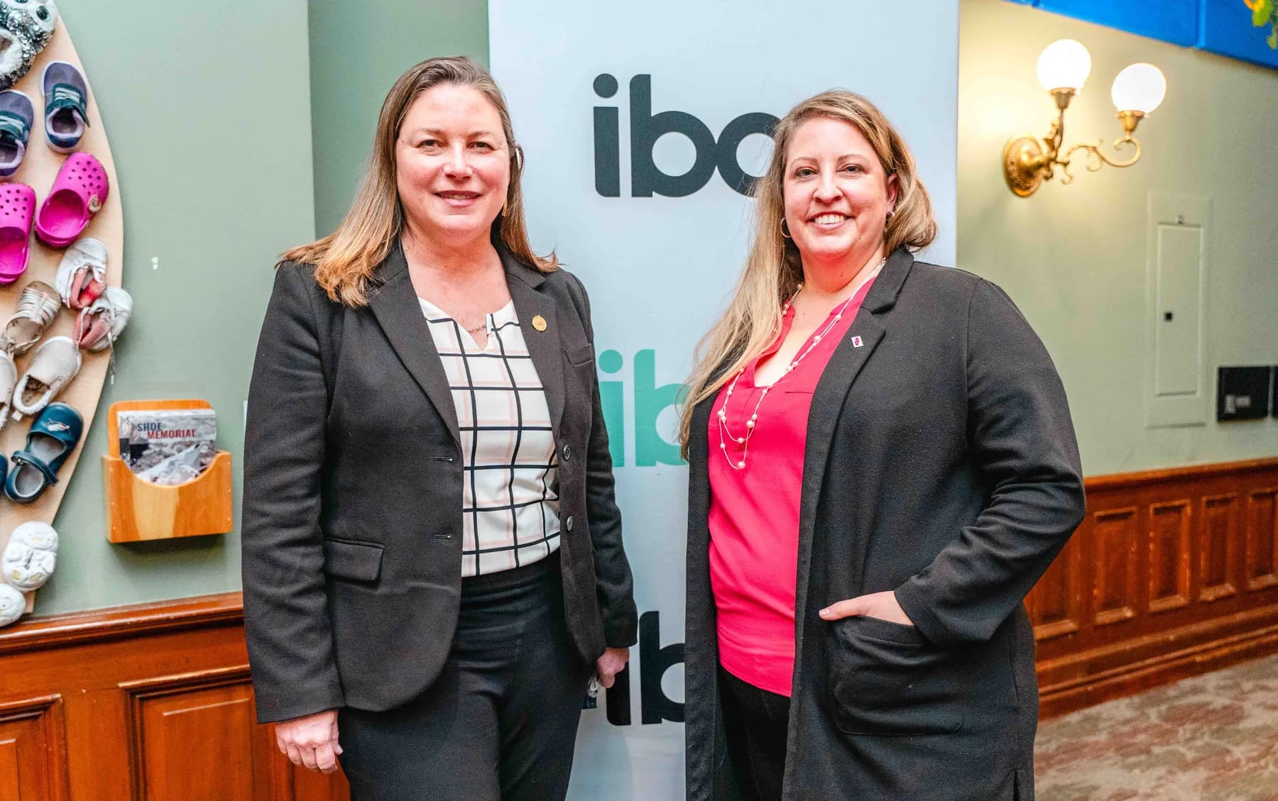 Two women posing together at the IBAO event at Queen’s Park.