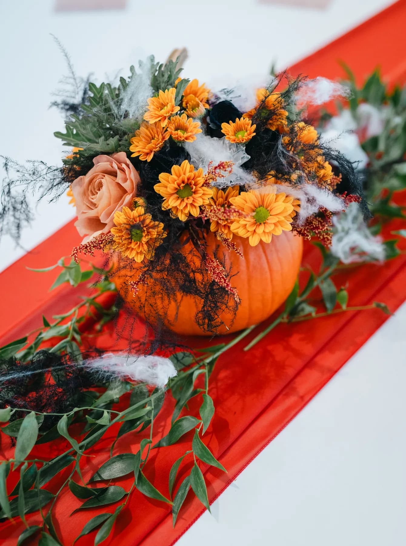 A Halloween floral centerpiece at Jenna and Jake’s Halloween party.