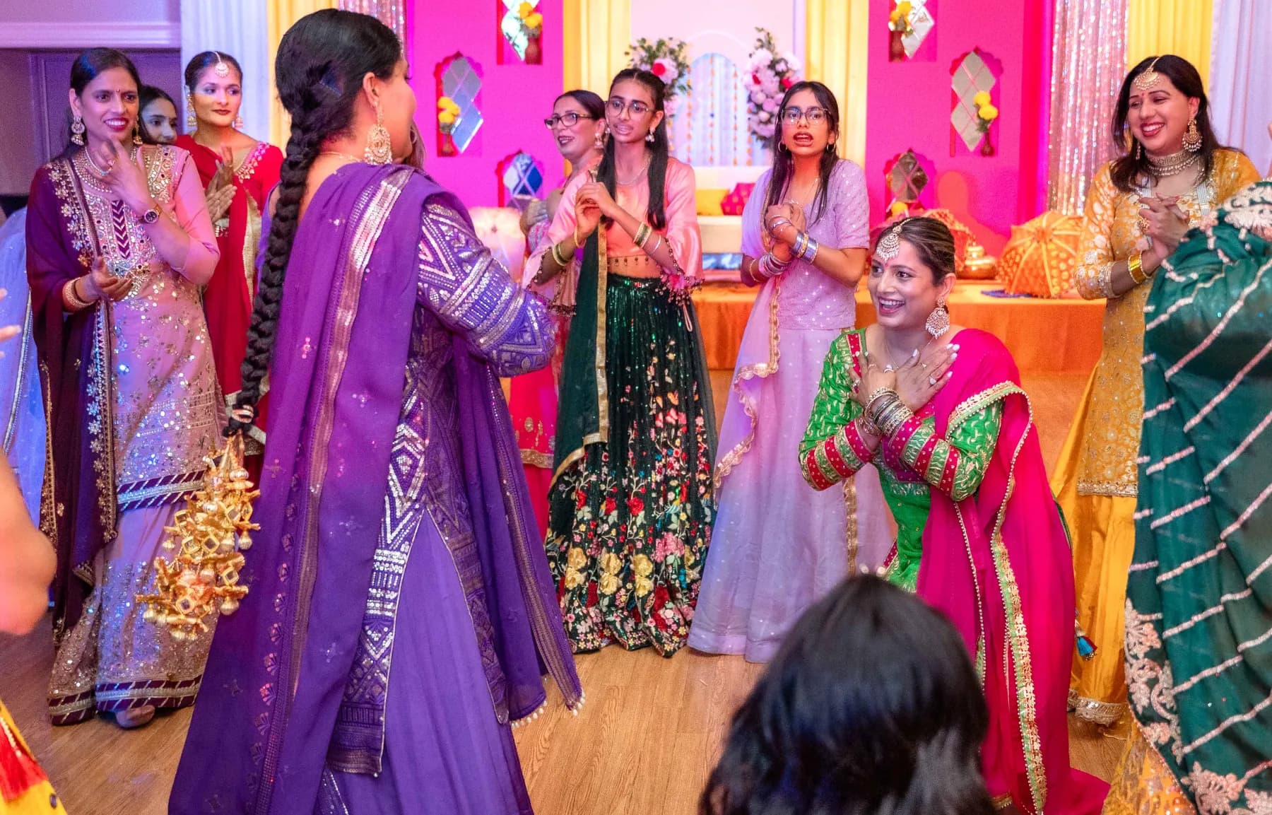 Guests enjoying the dance floor at Jessie and Erin’s Haldi celebration.