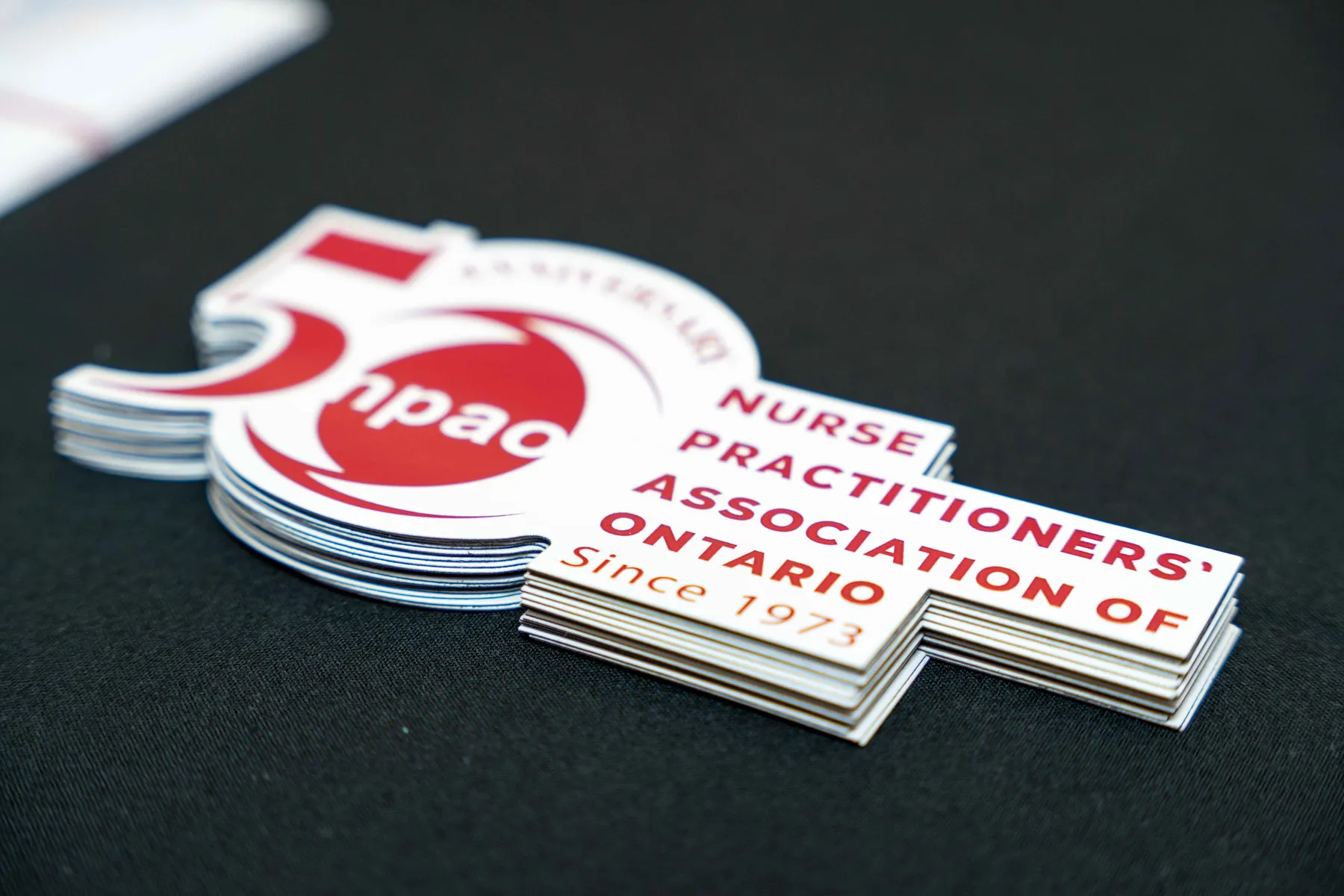 NPAO stickers on display at the NPAO event at Queen’s Park.