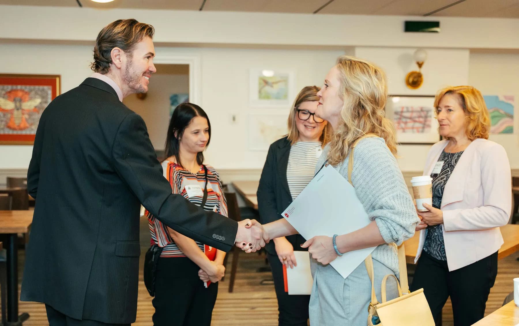 Participants greeting each other at the NPAO event at Queen’s Park.
