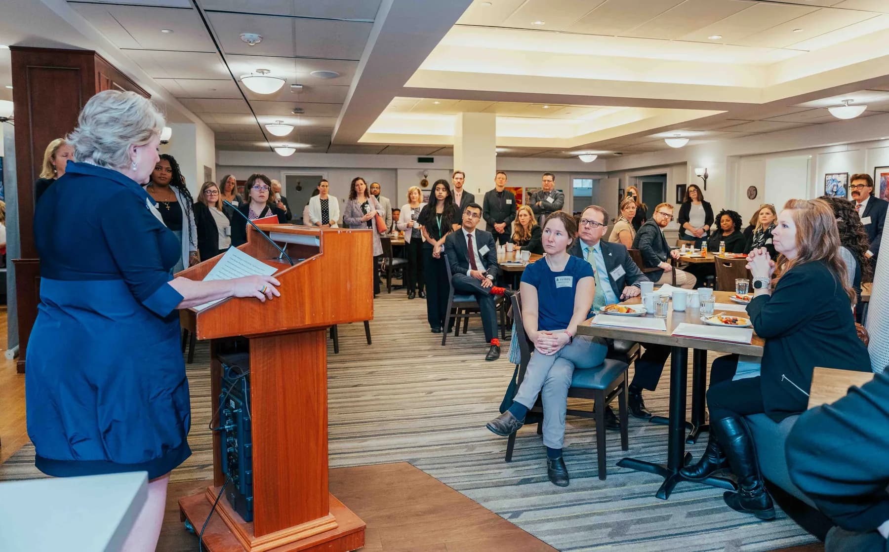 A speaker addressing the room at the NPAO event at Queen’s Park.