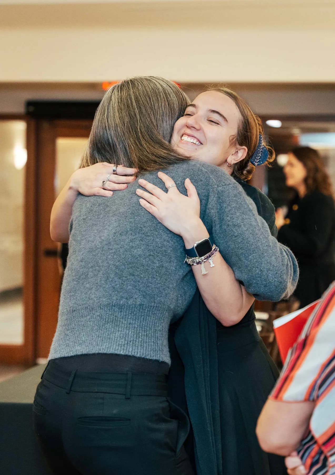 Participants sharing a hug at the NPAO event at Queen’s Park.