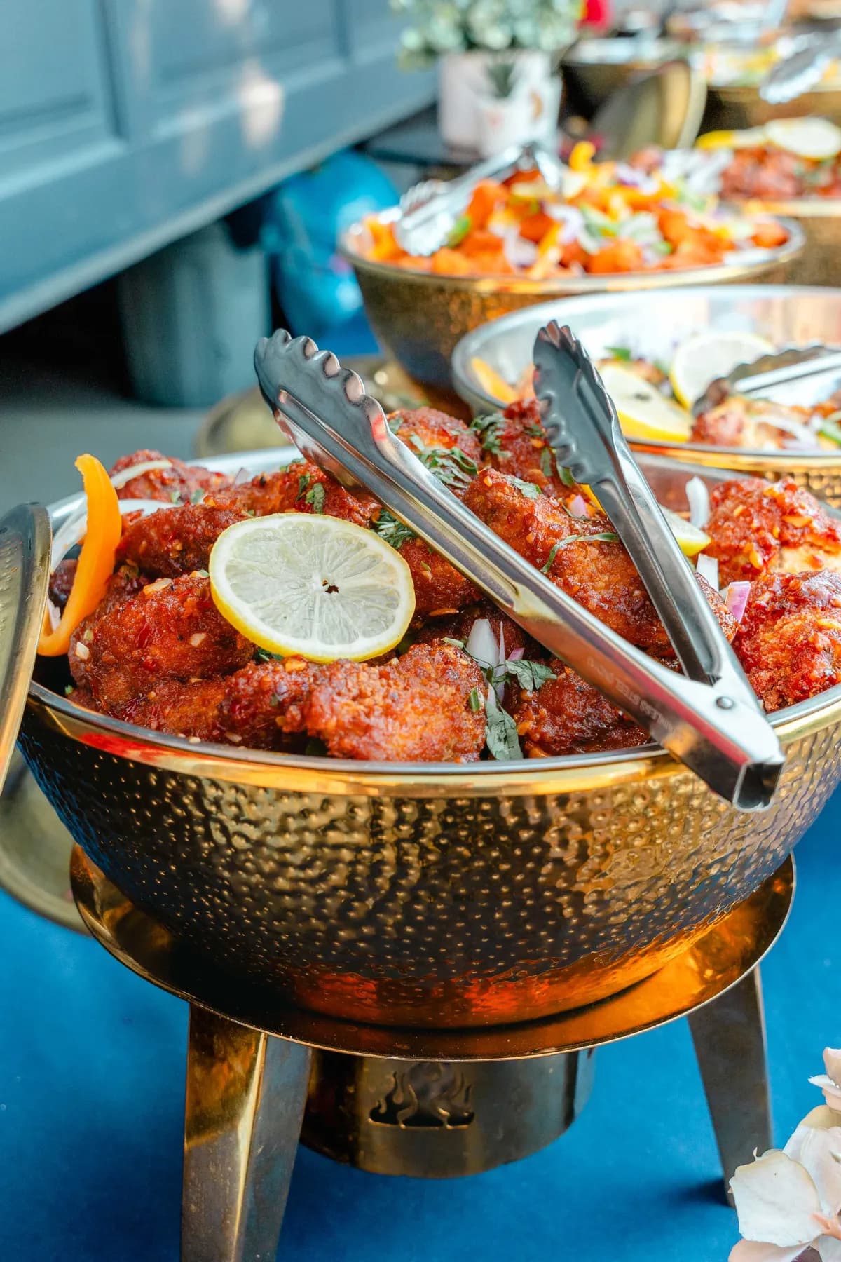 Food arranged for the celebration at Aaron’s Haldi celebration.
