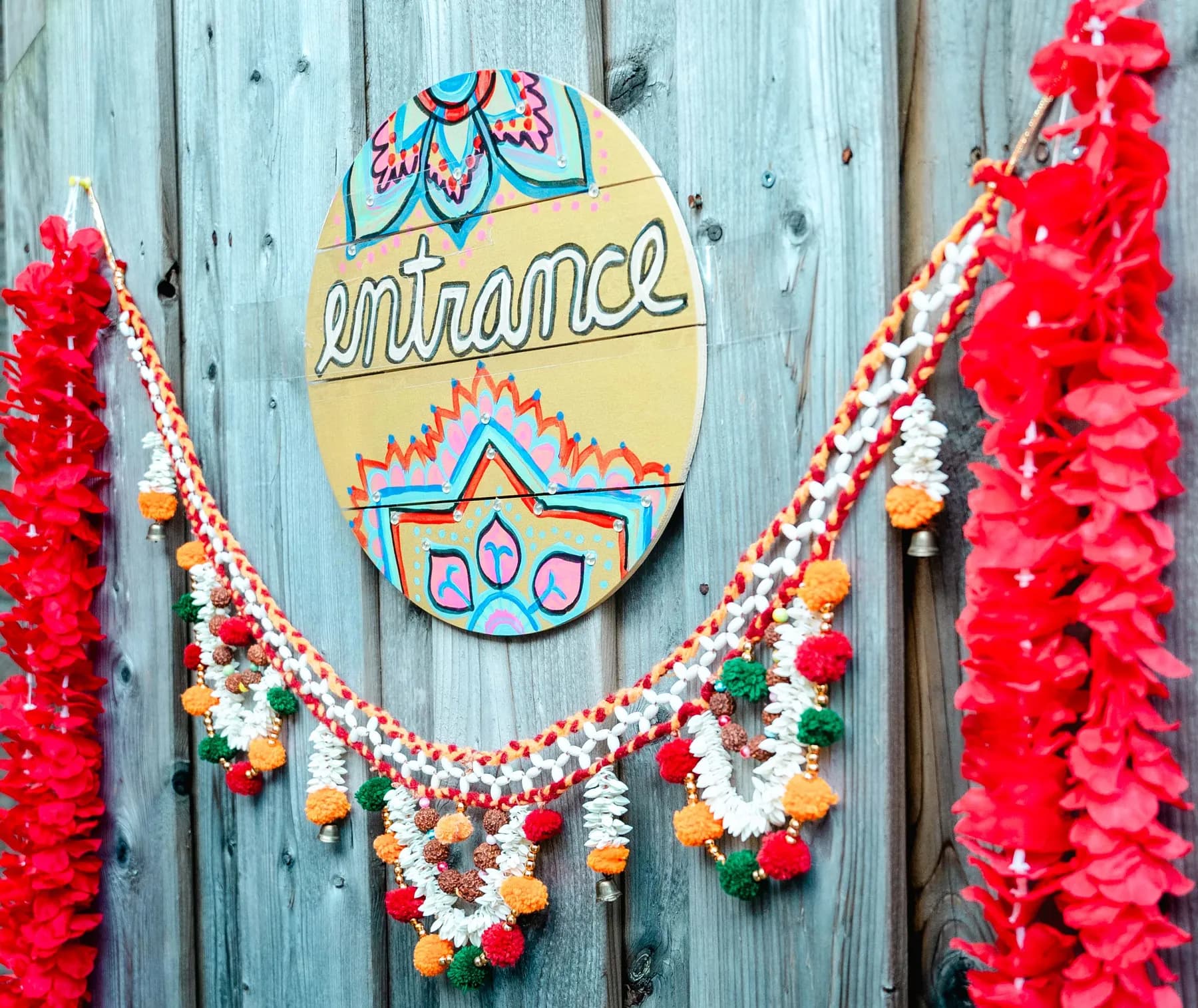 Garlands decorating the celebration at Aaron’s Haldi celebration.