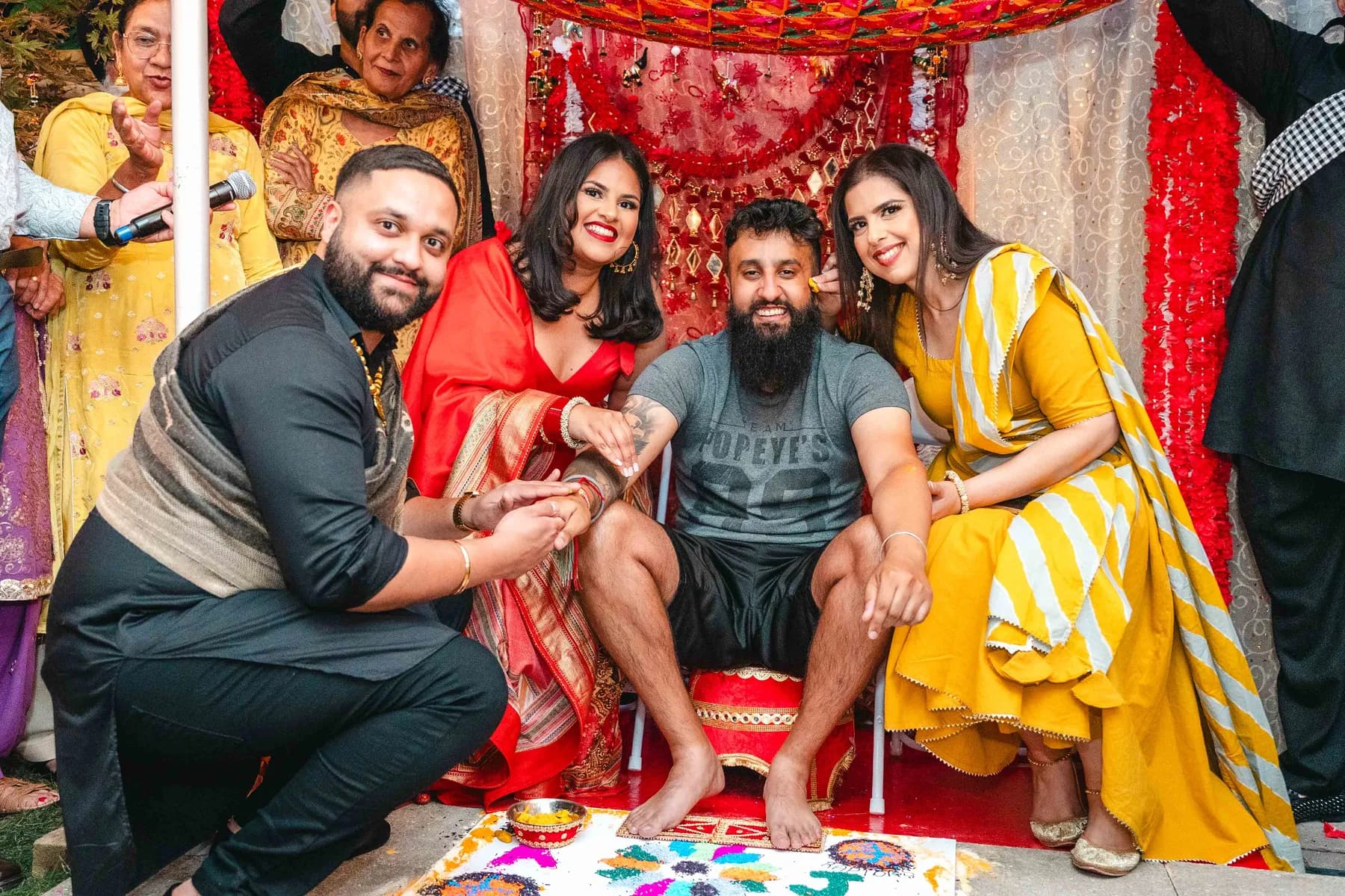 Guests posing during the Haldi ceremony at Aaron’s Haldi celebration.