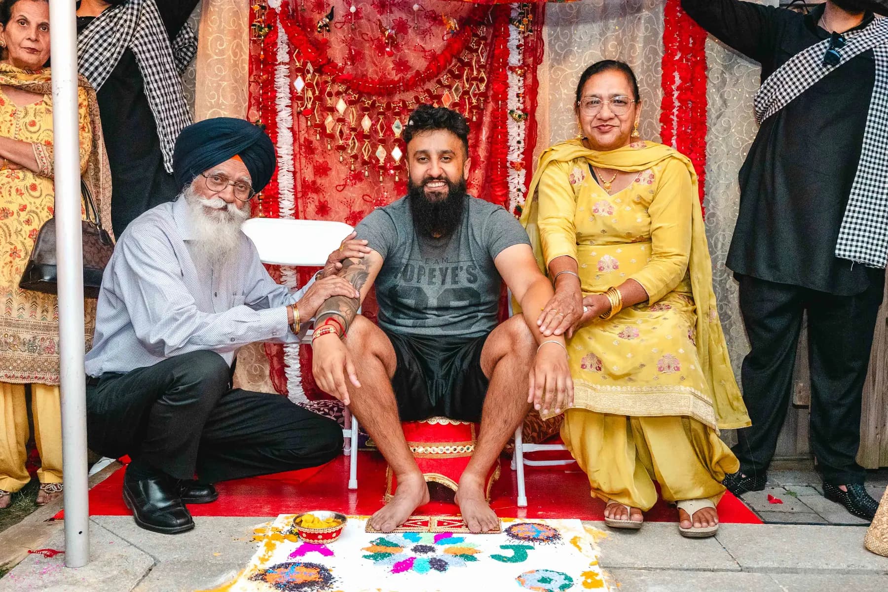 Guests posing during the Haldi ceremony at Aaron’s Haldi celebration.