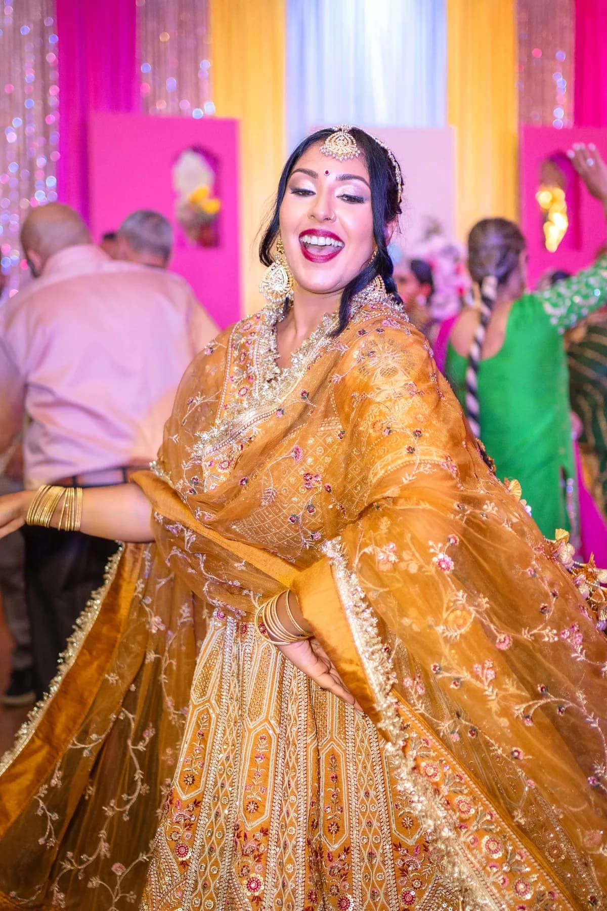 Guests enjoying the dance floor at Jessie and Erin’s Haldi celebration.