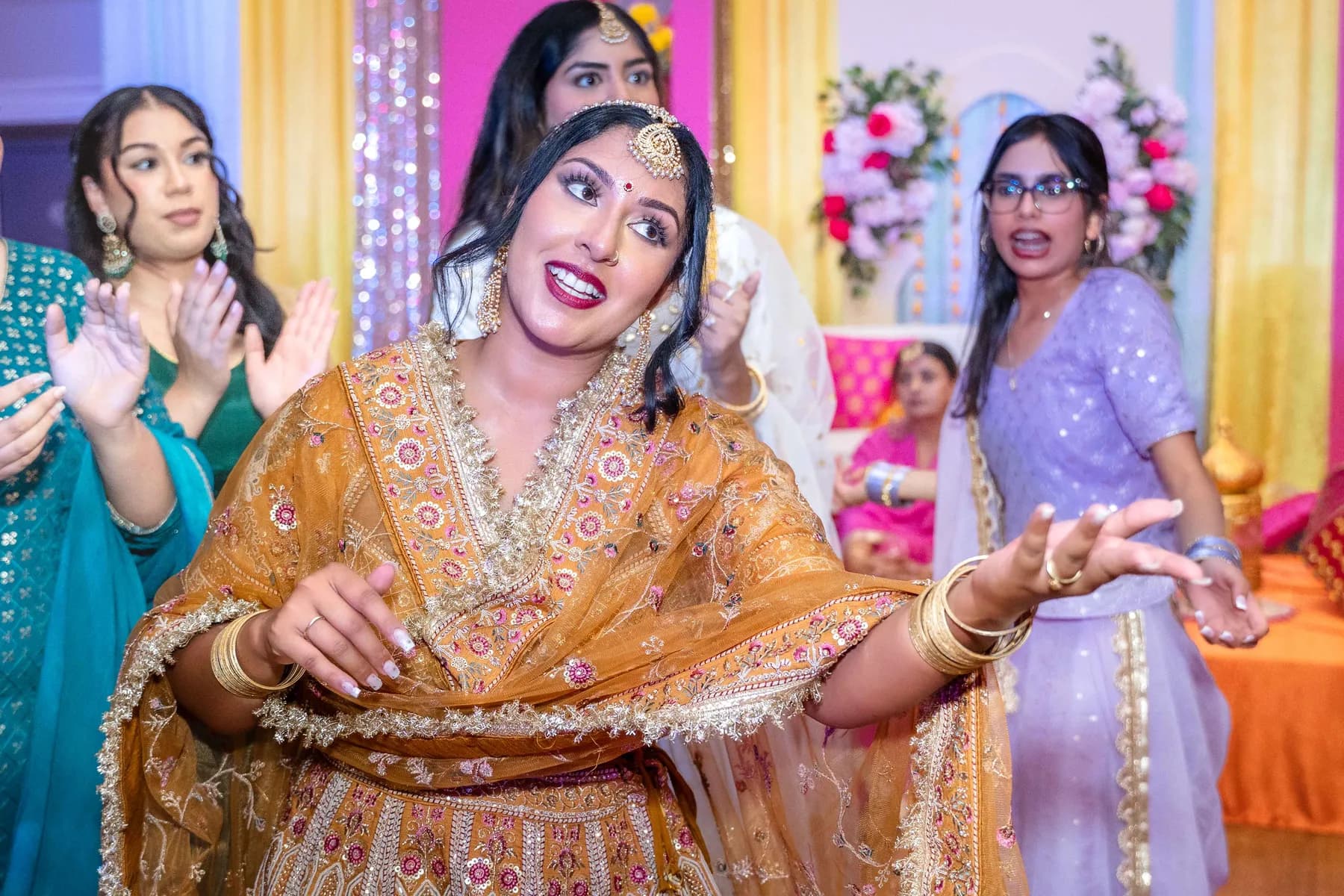 Guests enjoying the dance floor at Jessie and Erin’s Haldi celebration.