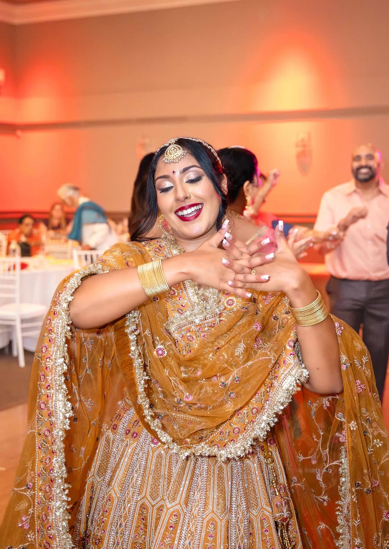 Guests enjoying the dance floor at Jessie and Erin’s Haldi celebration.
