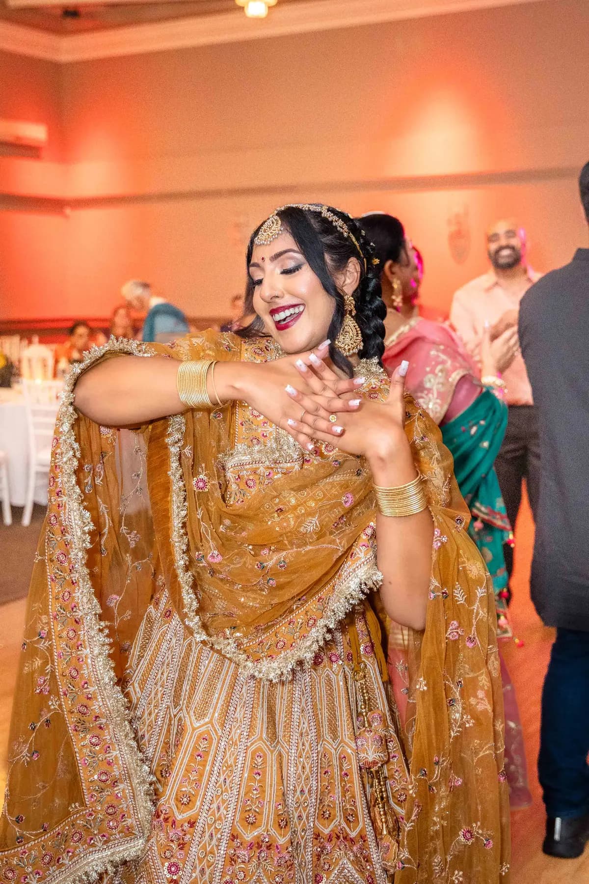 Guests enjoying the dance floor at Jessie and Erin’s Haldi celebration.