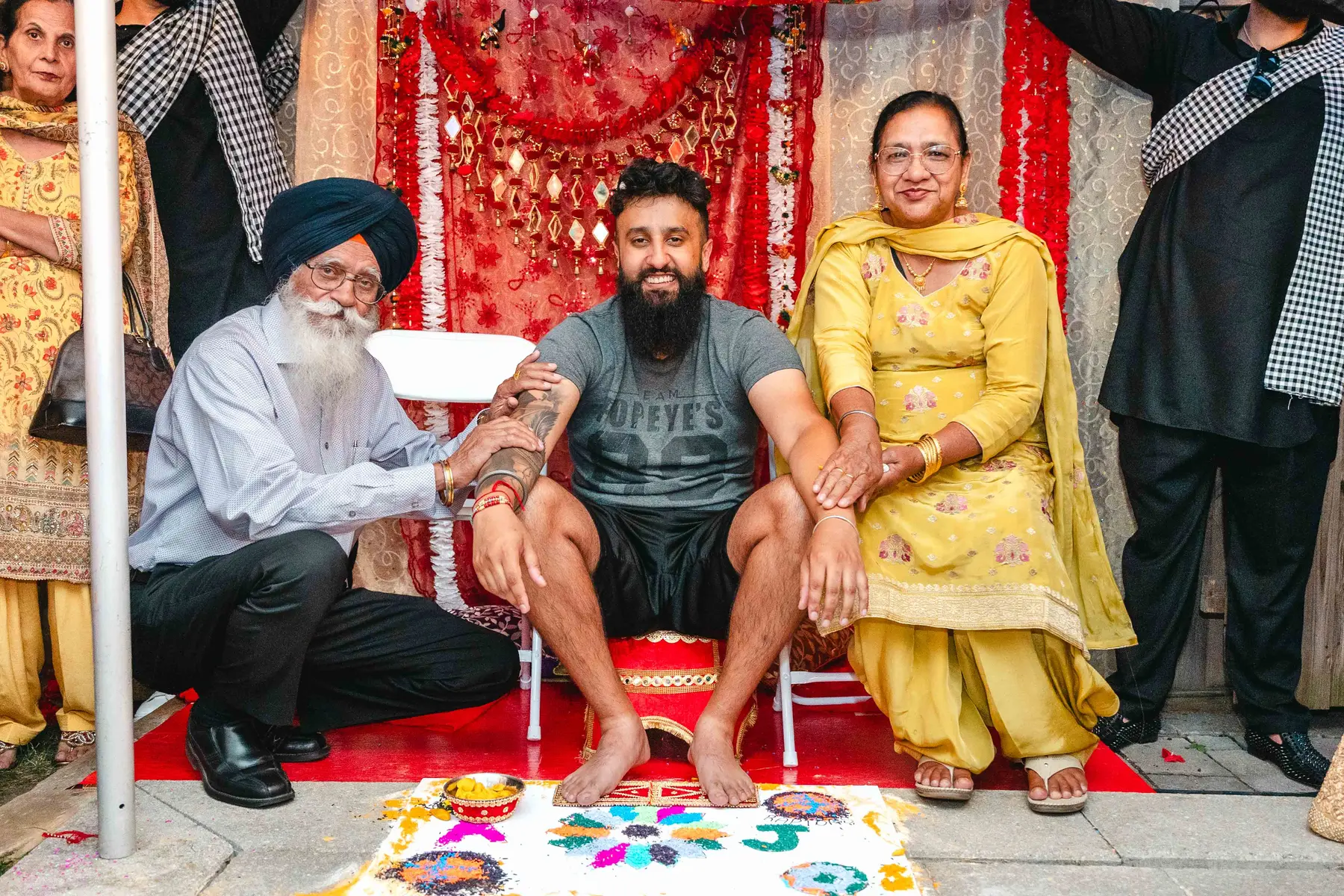 Guests posing during the Haldi ceremony at Aaron’s Haldi celebration.