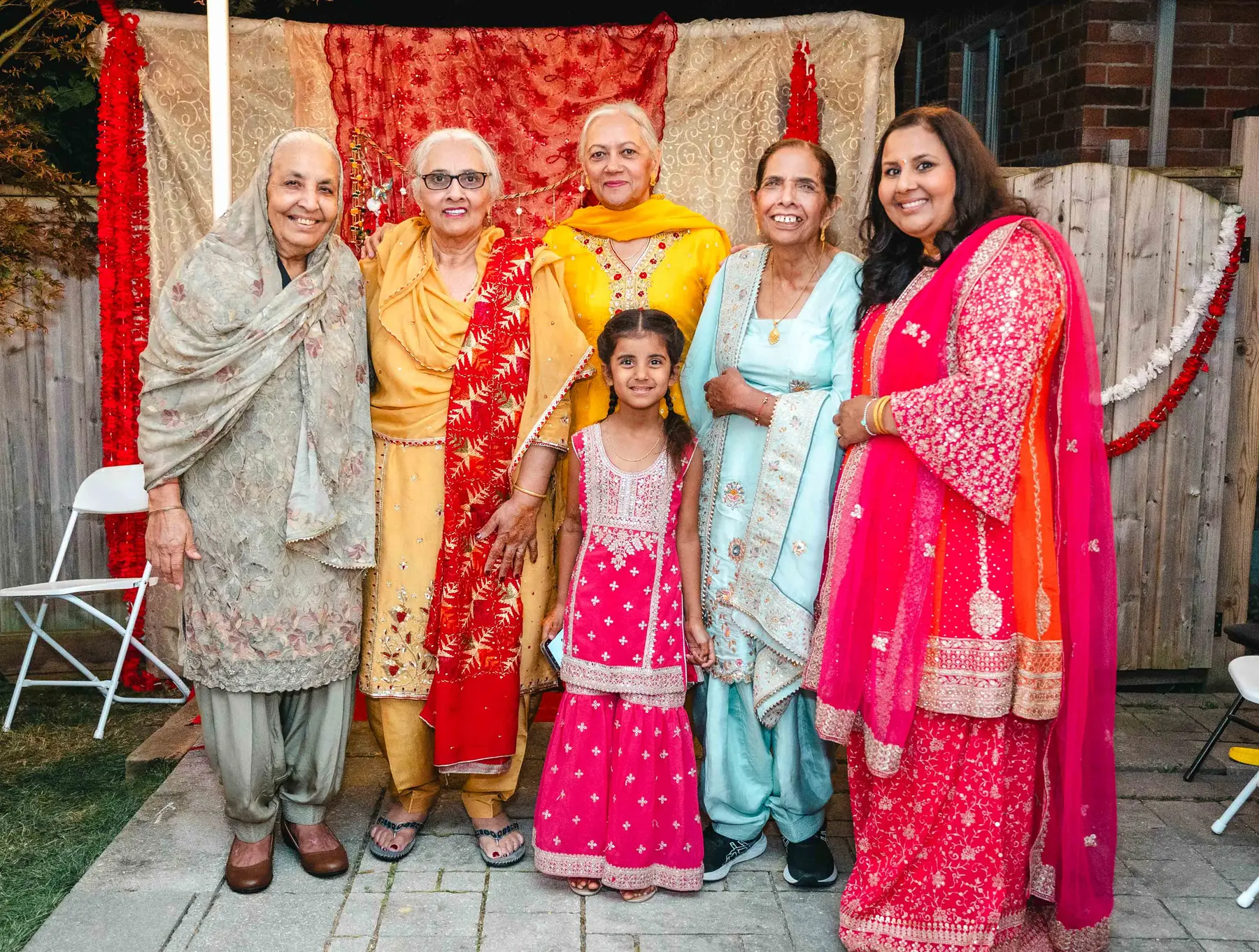 Guests posing together at Aaron’s Haldi celebration.
