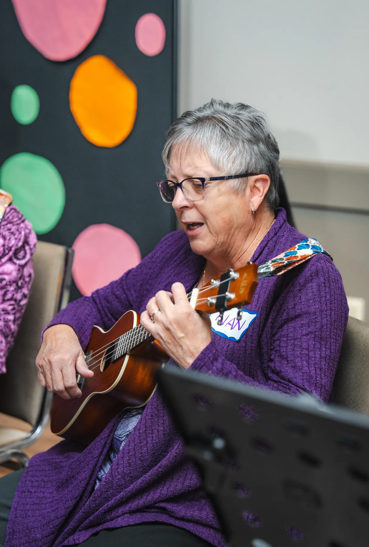 Musicians playing ukuleles at Alison’s birthday celebration.