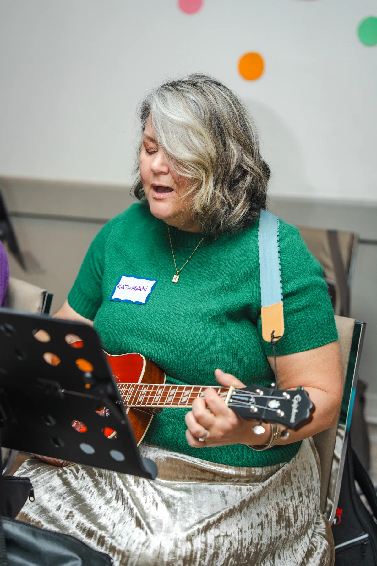 Musicians playing ukuleles at Alison’s birthday celebration.