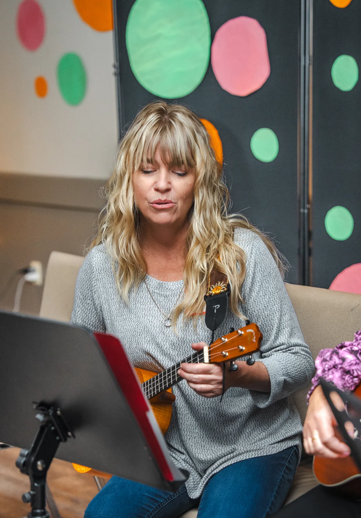 Musicians playing ukuleles at Alison’s birthday celebration.