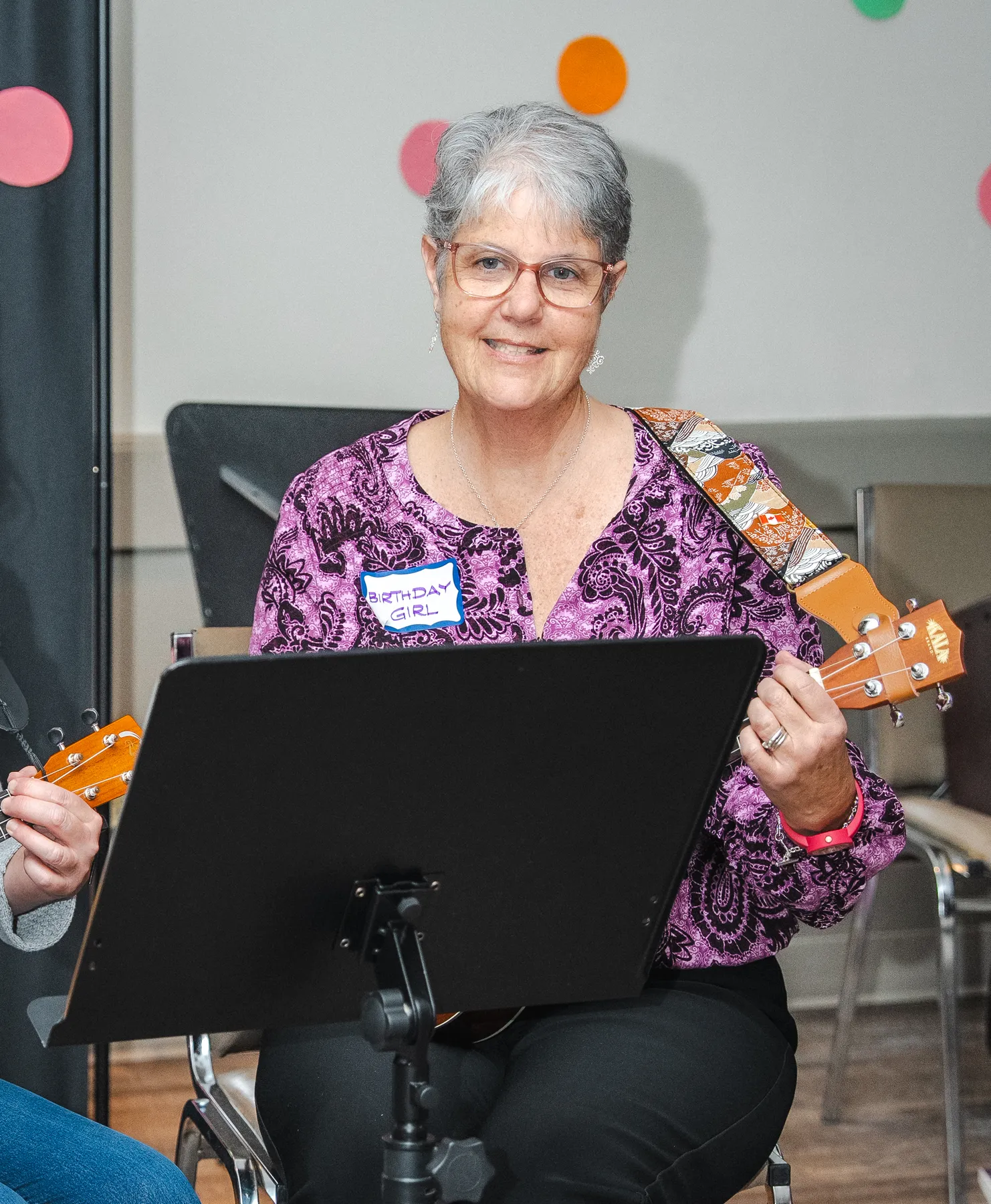 Musicians playing ukuleles at Alison’s birthday celebration.