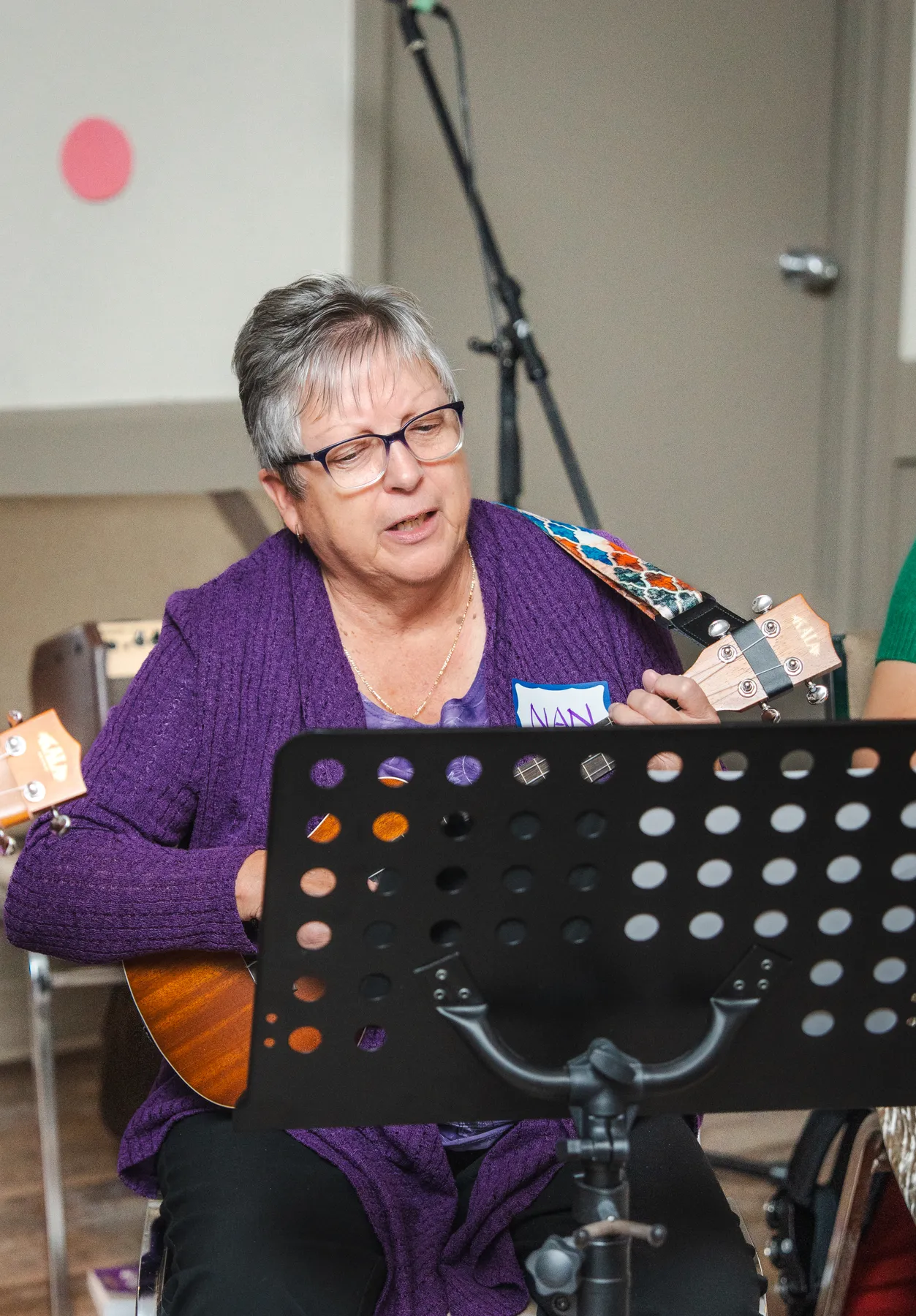 Musicians playing ukuleles at Alison’s birthday celebration.