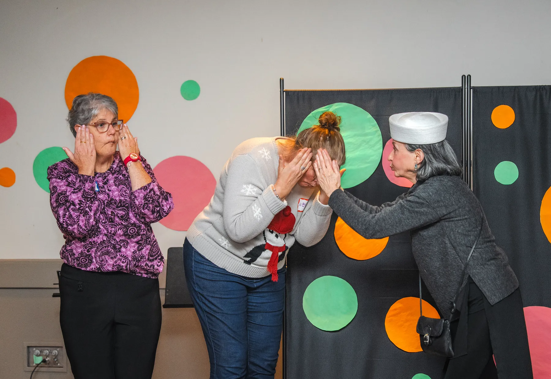 Guests taking part in a playful group performance at Alison’s birthday celebration.