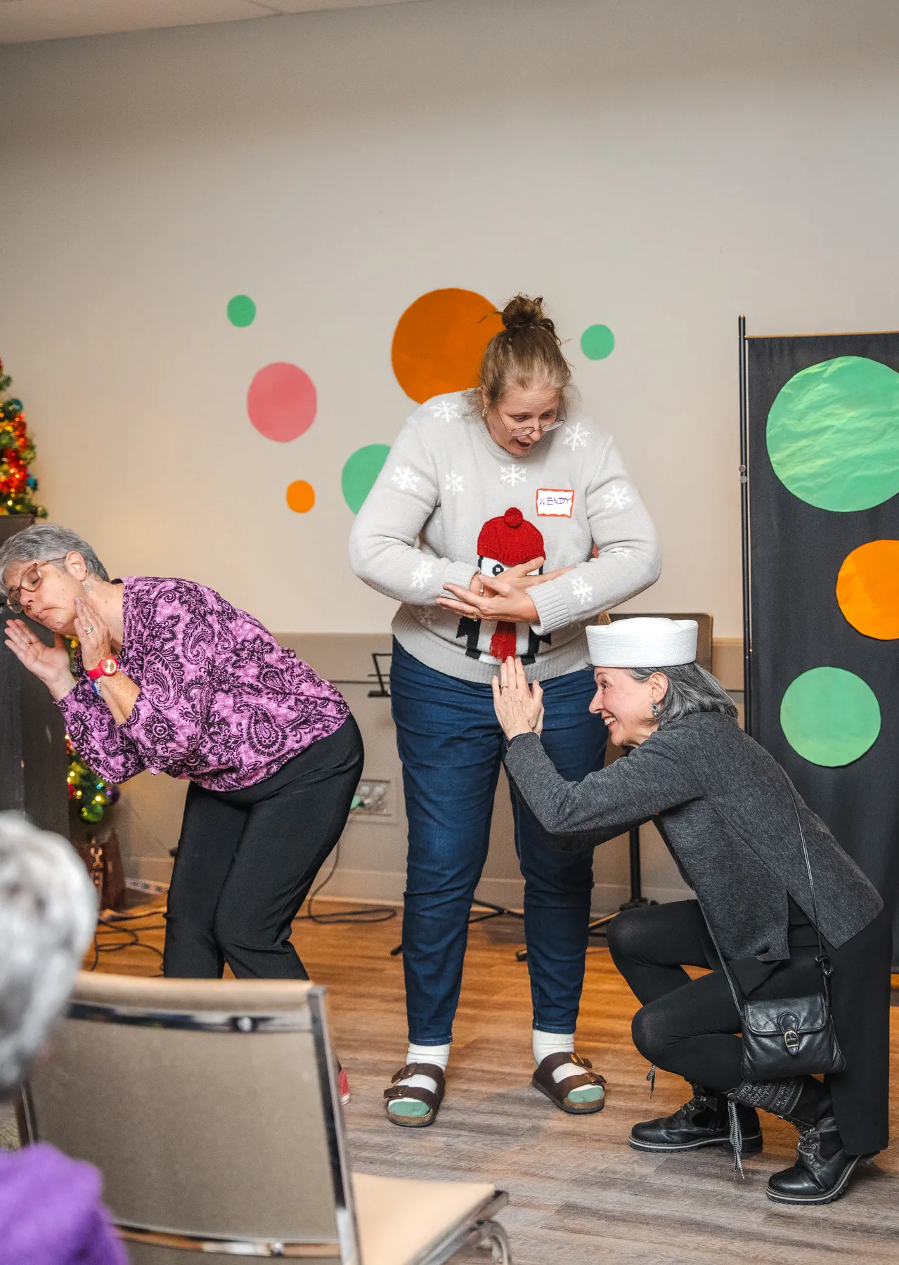 Guests taking part in a playful group performance at Alison’s birthday celebration.