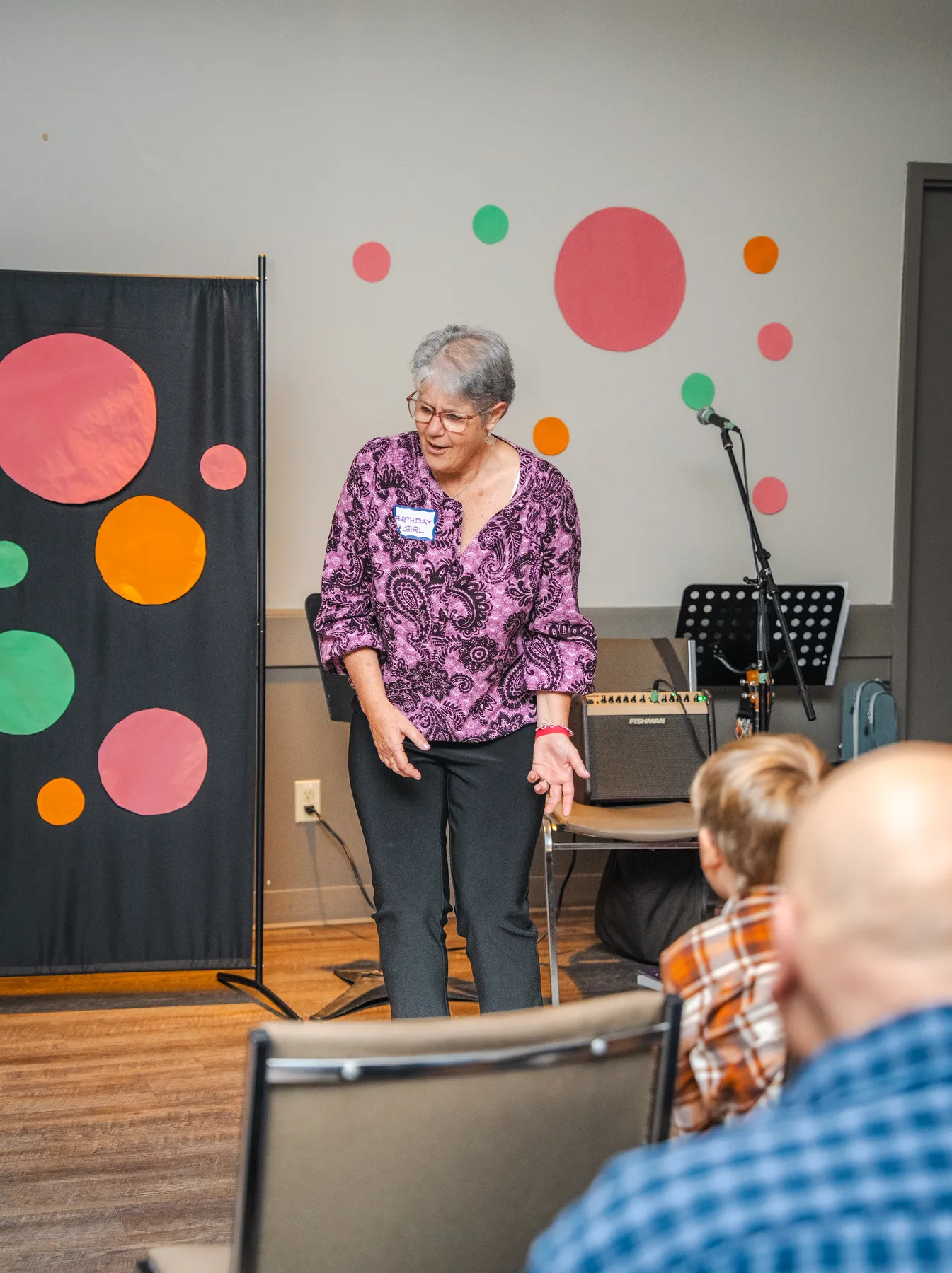 A woman addressing the guests at Alison’s birthday celebration.