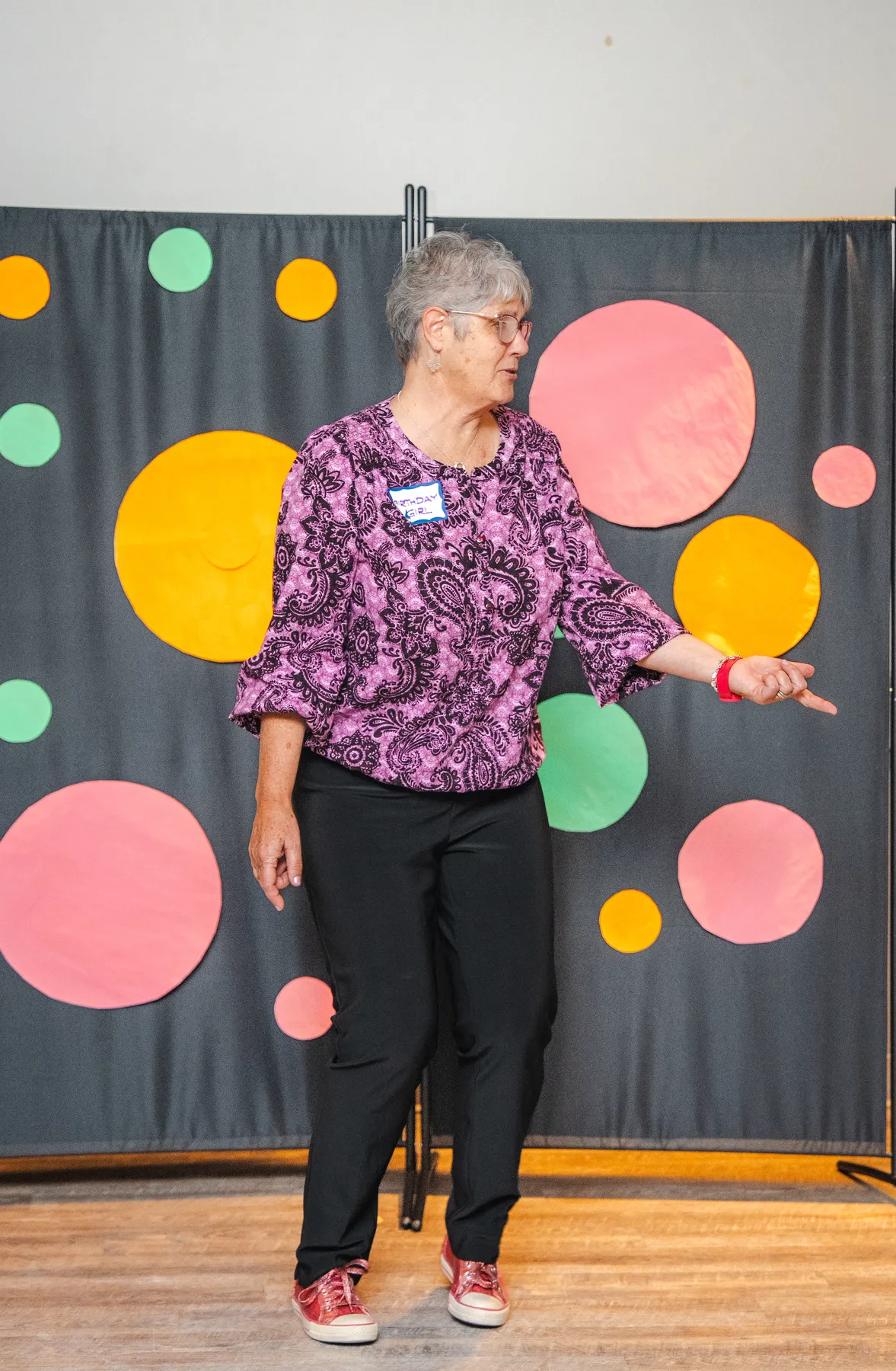A woman addressing the guests at Alison’s birthday celebration.