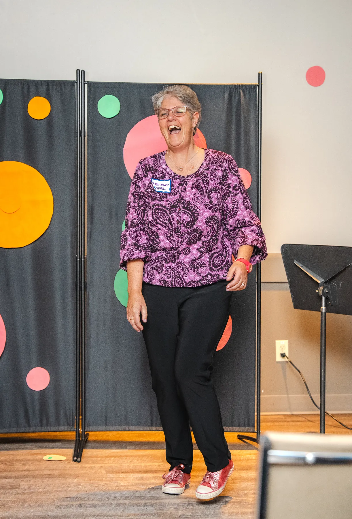 A woman addressing the guests at Alison’s birthday celebration.
