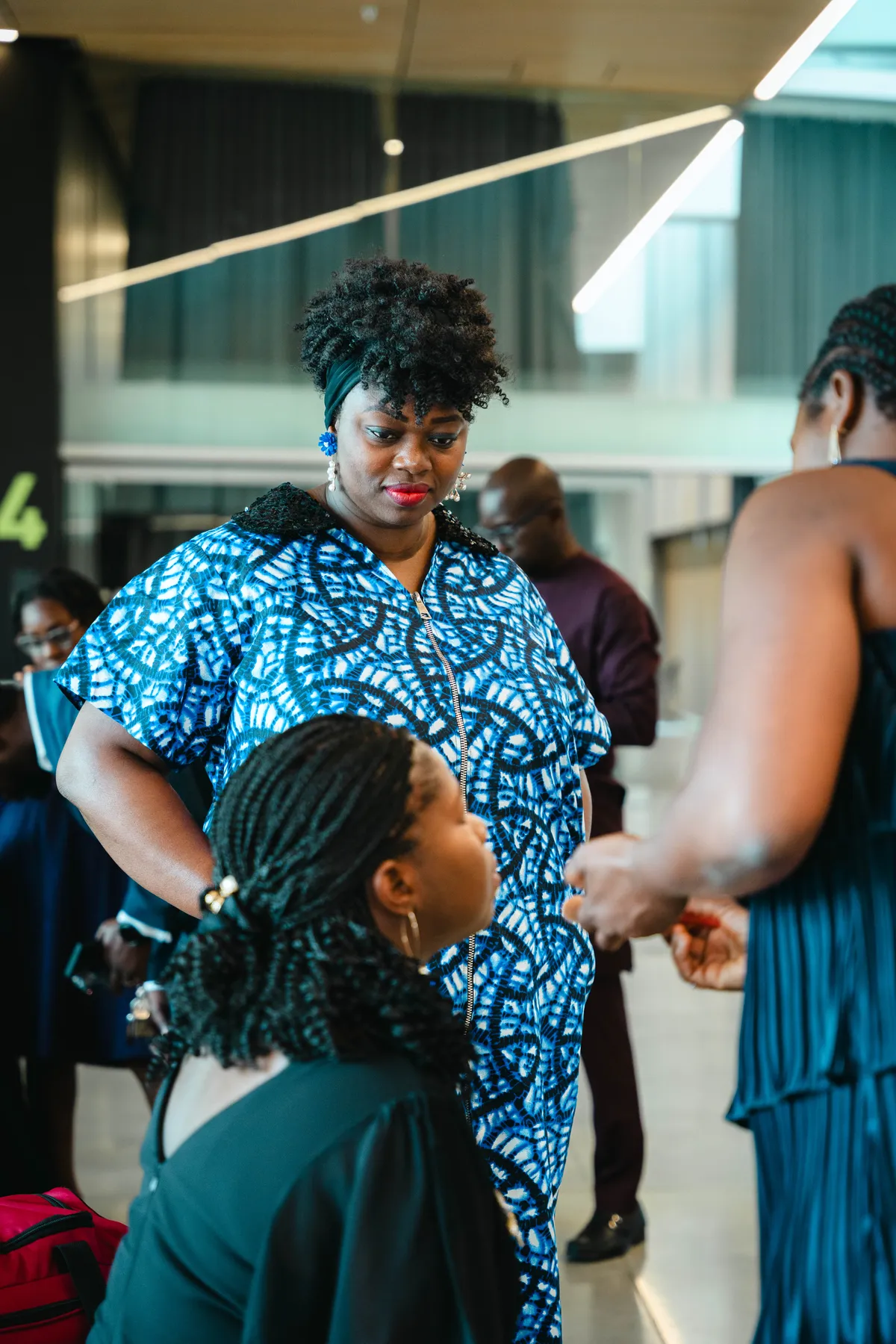 A woman with a child at BJ’s 40th birthday party.