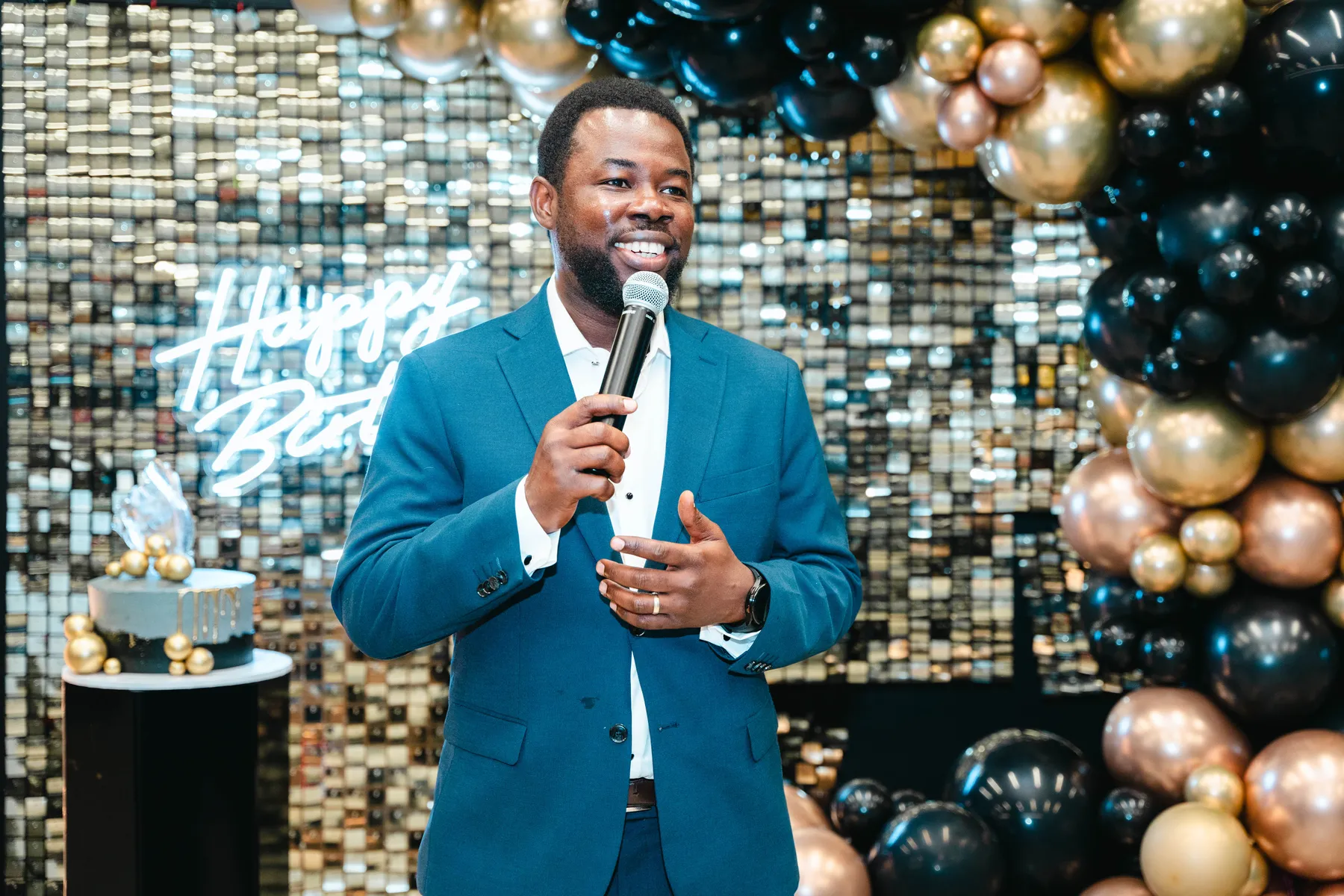 A man giving a speech at BJ’s 40th birthday party.