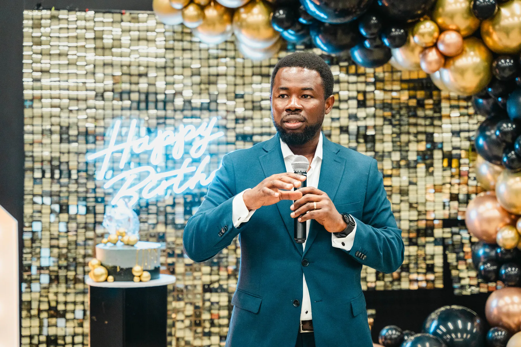 A man giving a speech at BJ’s 40th birthday party.