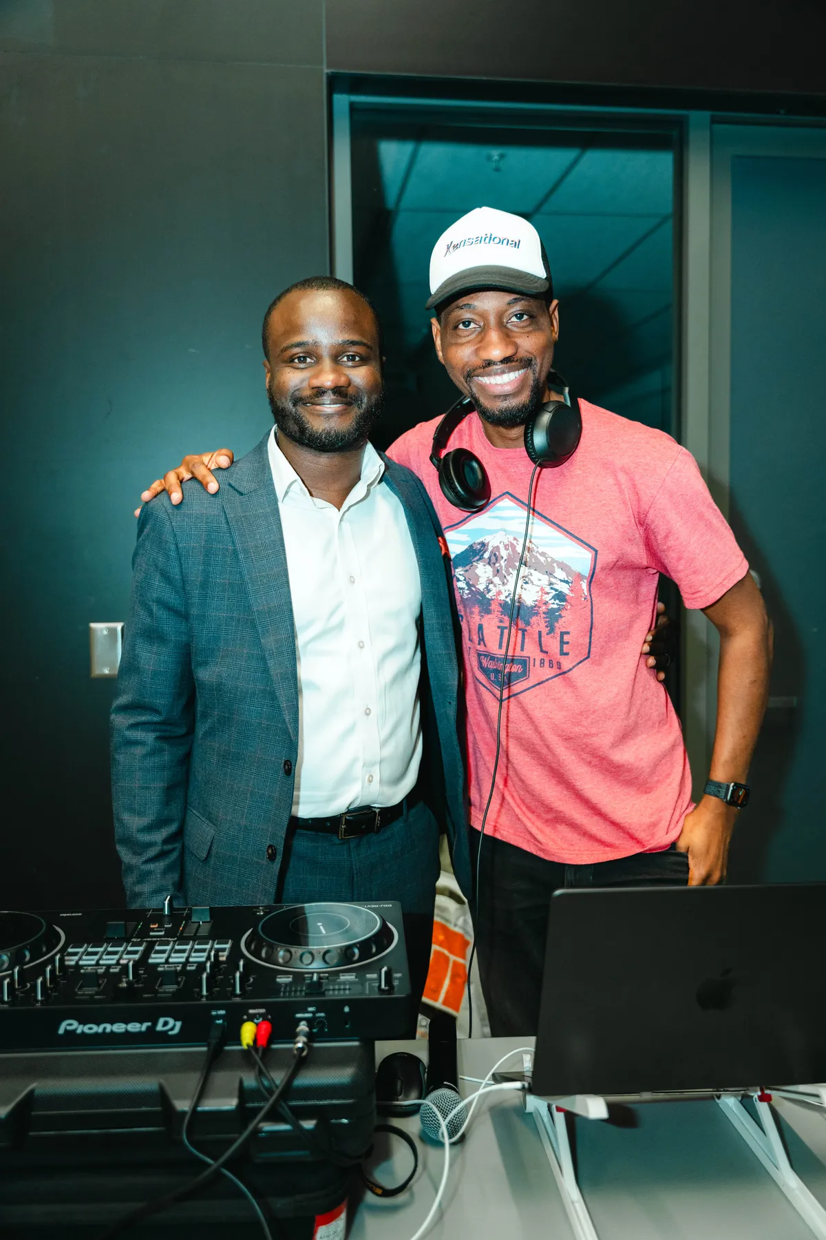 The DJ posing with a guest at BJ’s 40th birthday party.