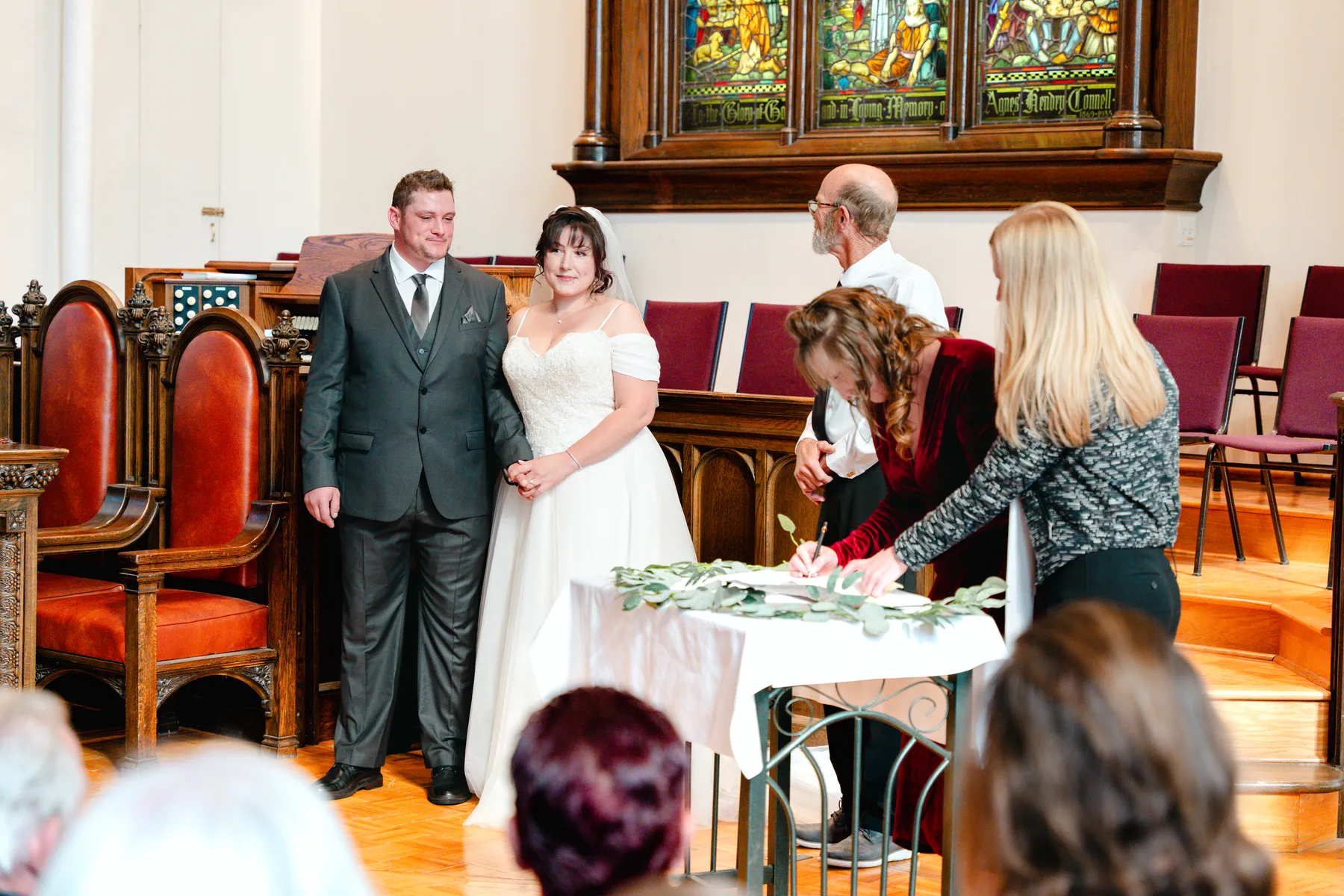 Wedding documents being signed at Kody and Jaz’s wedding.