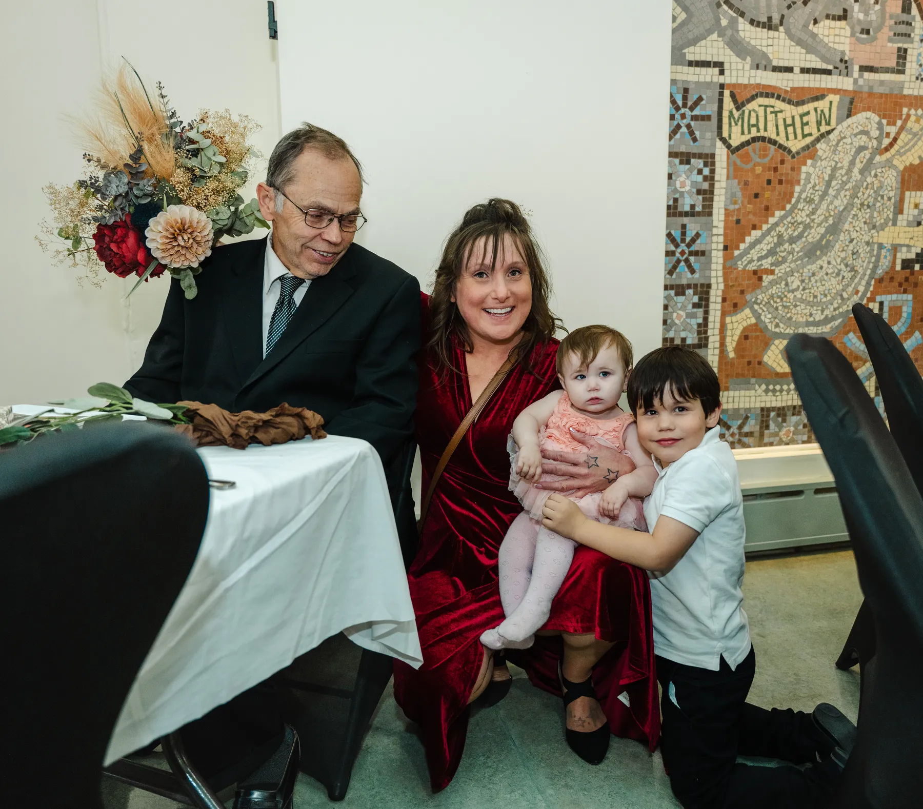 Details and guests in the reception room at Kody and Jaz’s wedding.